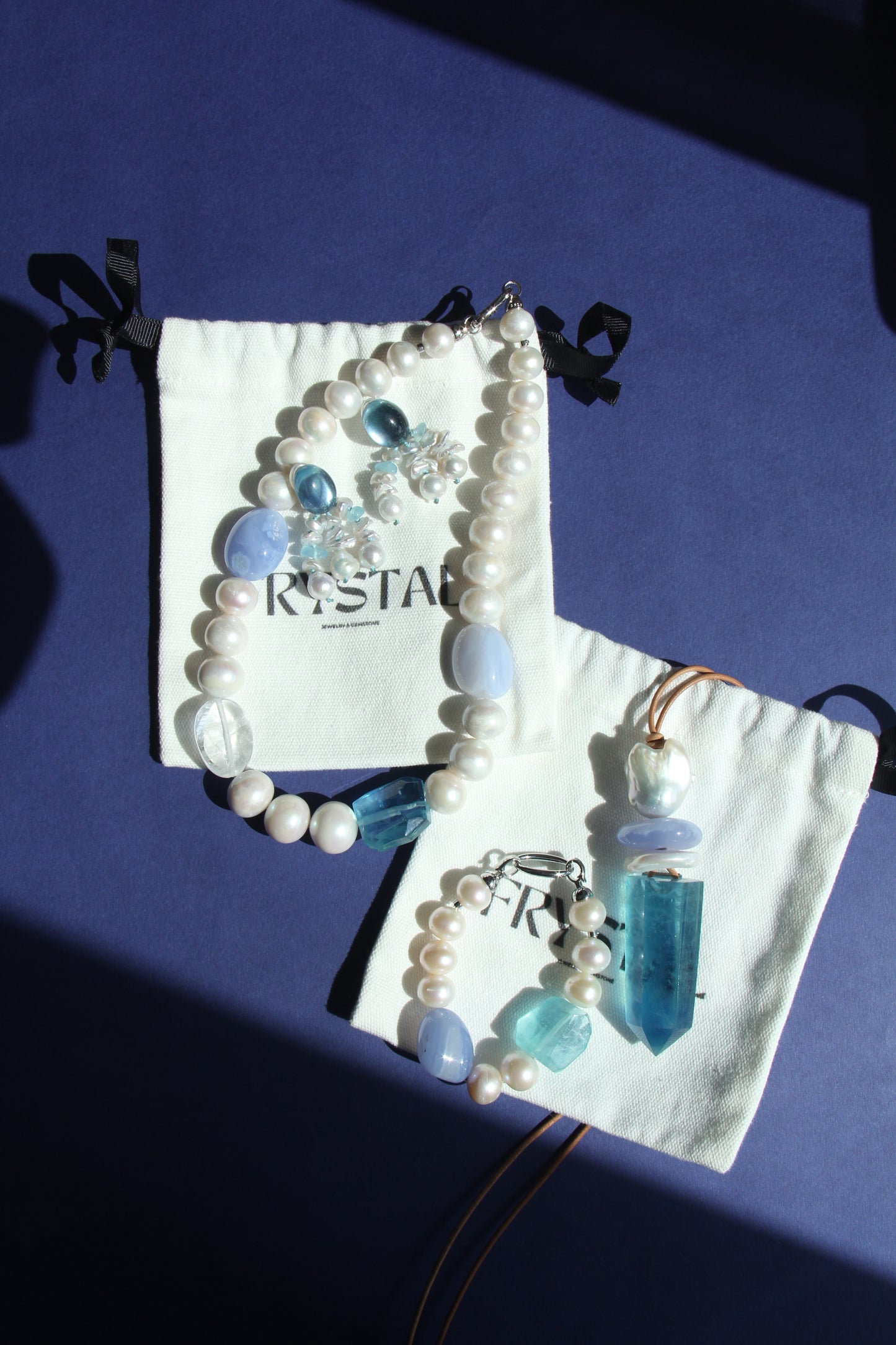 Earrings: pearls, aquamarine