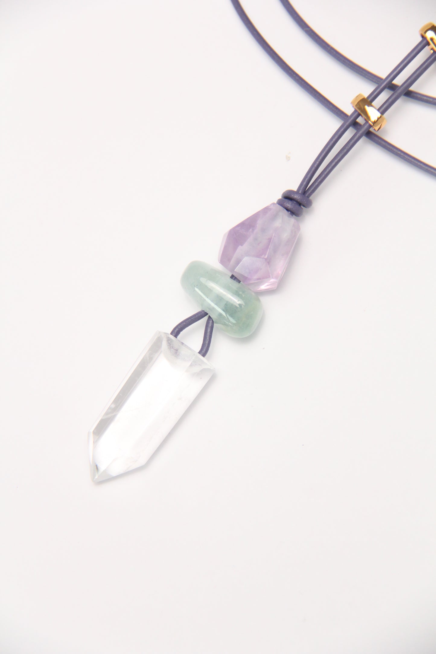 Pendant: amethyst, moganite, quartz, leather
