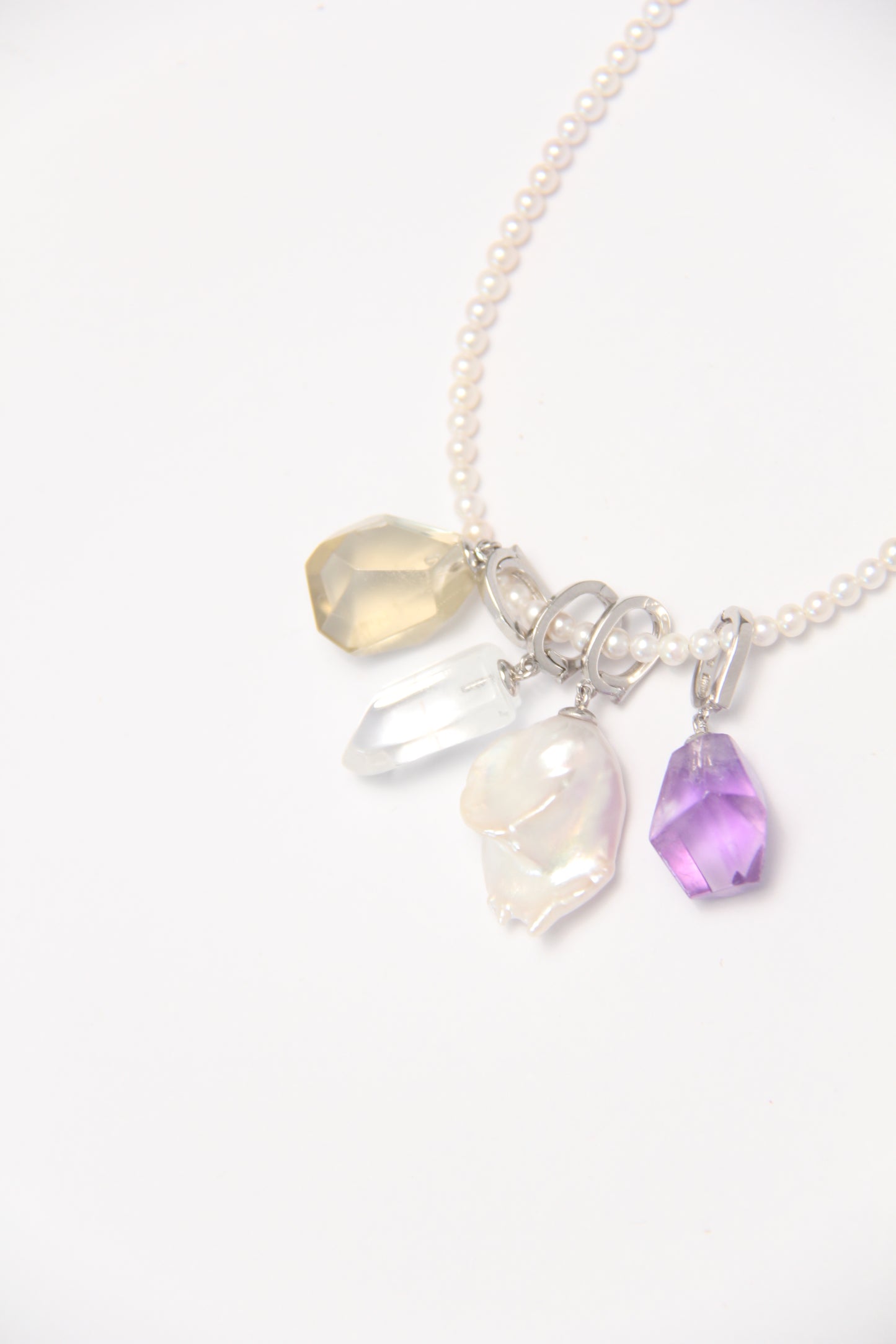 Charms: citrine, quartz , pearls, amethyst