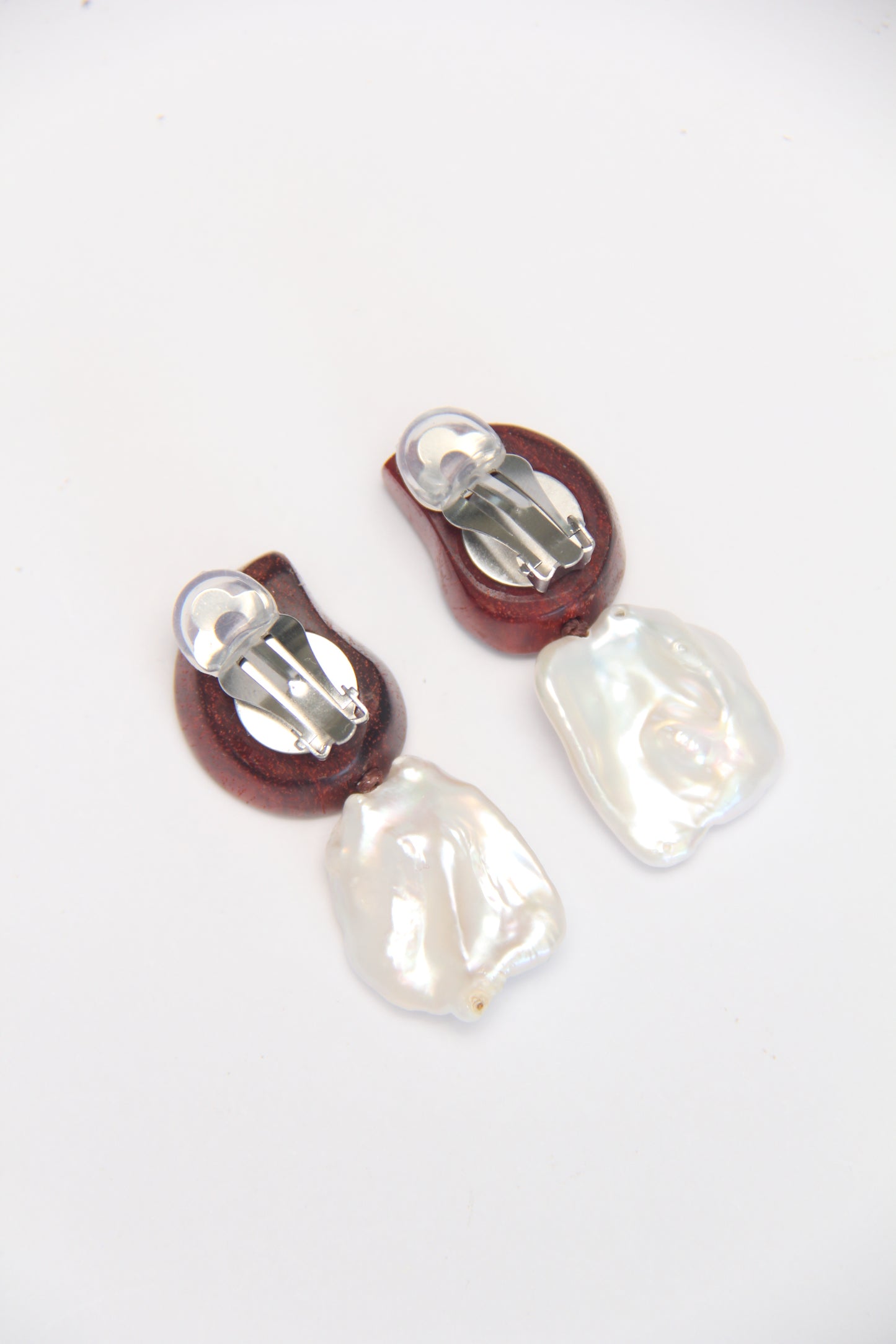 Earrings: ammonite, Zambia blood wood, pearls