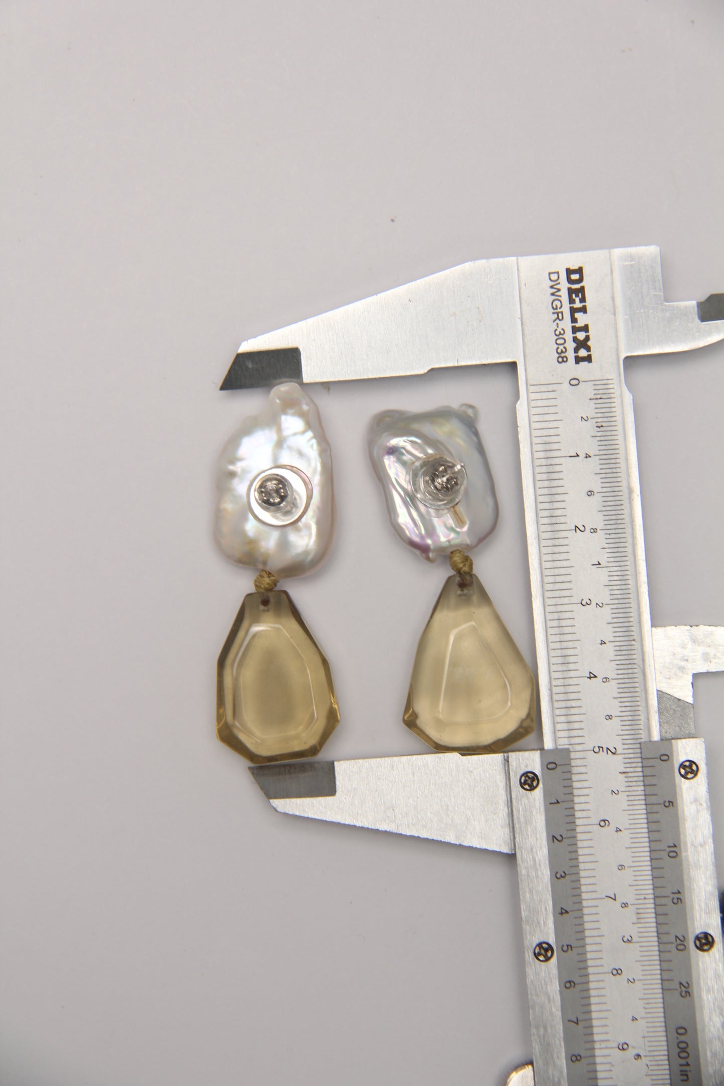 Earrings: pearls, citrine
