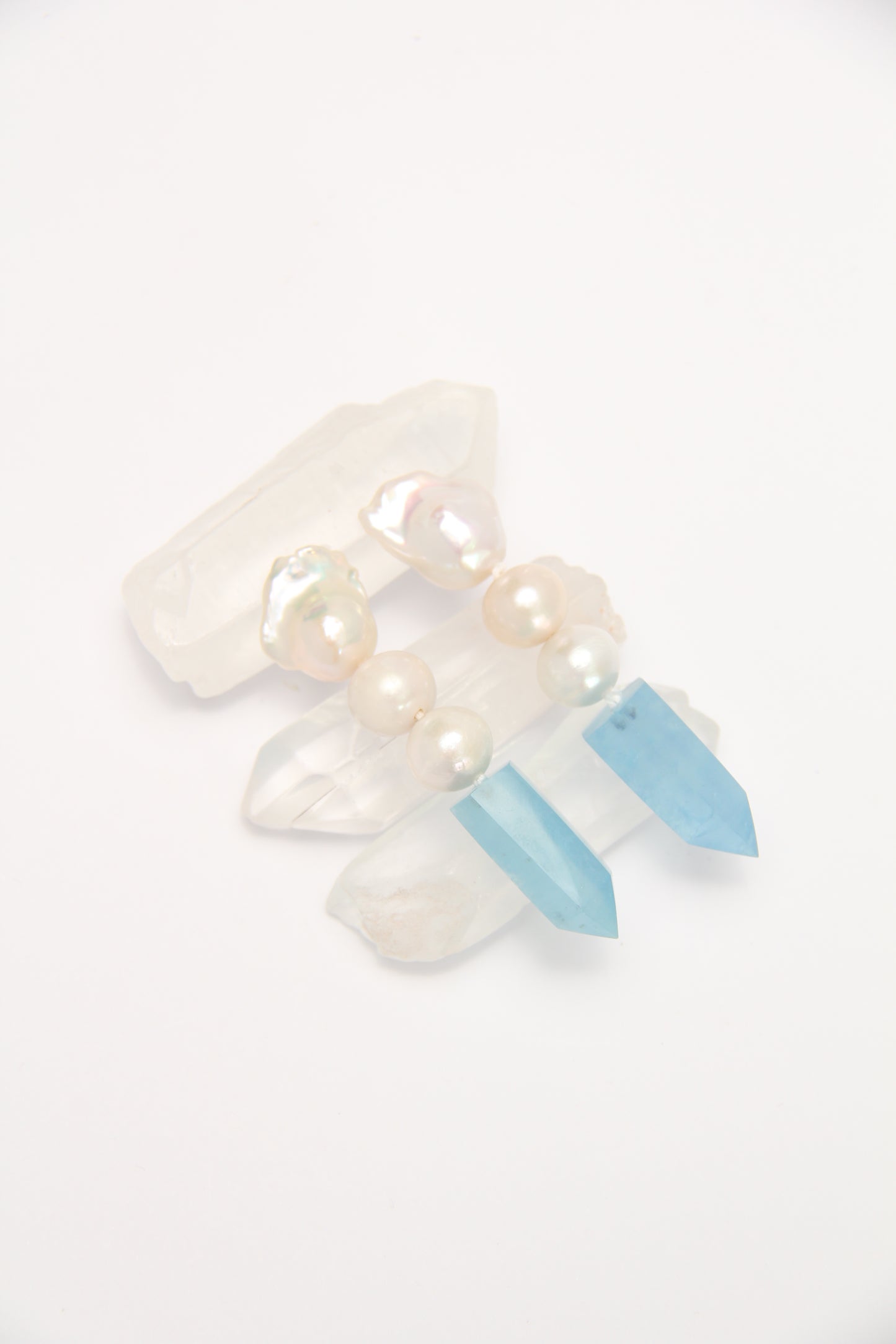 Earrings: pearls, aquamarine