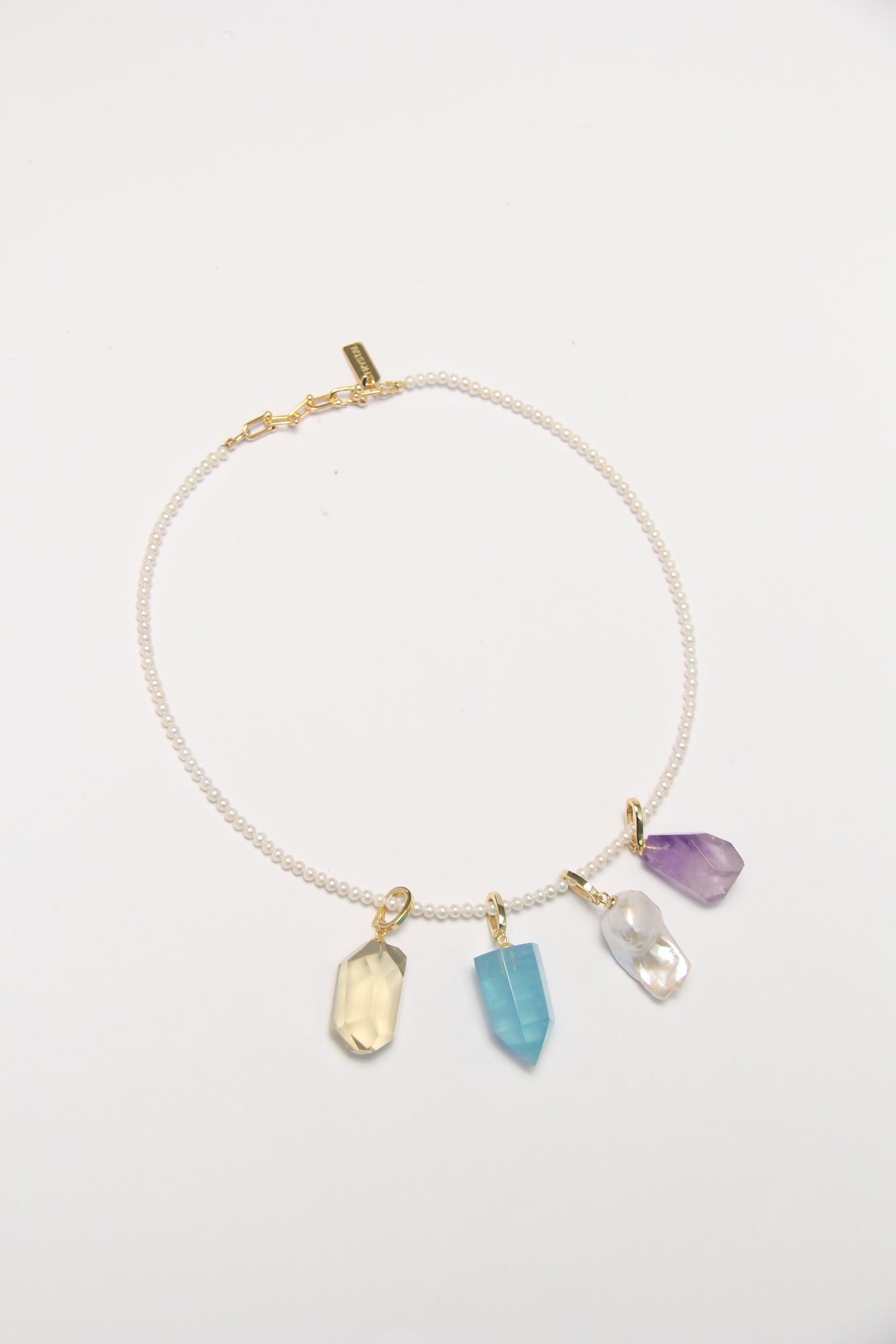 Charms: citrine, aquamarine, pearls, amethyst
