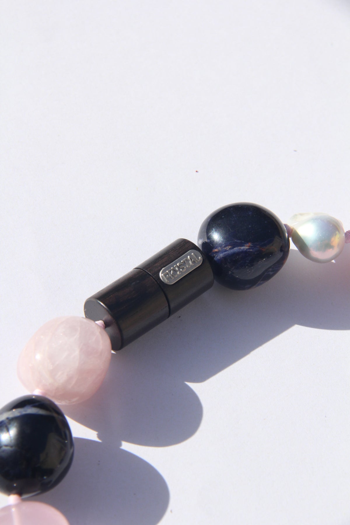 Necklace: kunzite, blue vein stone, rose quartz, pearls