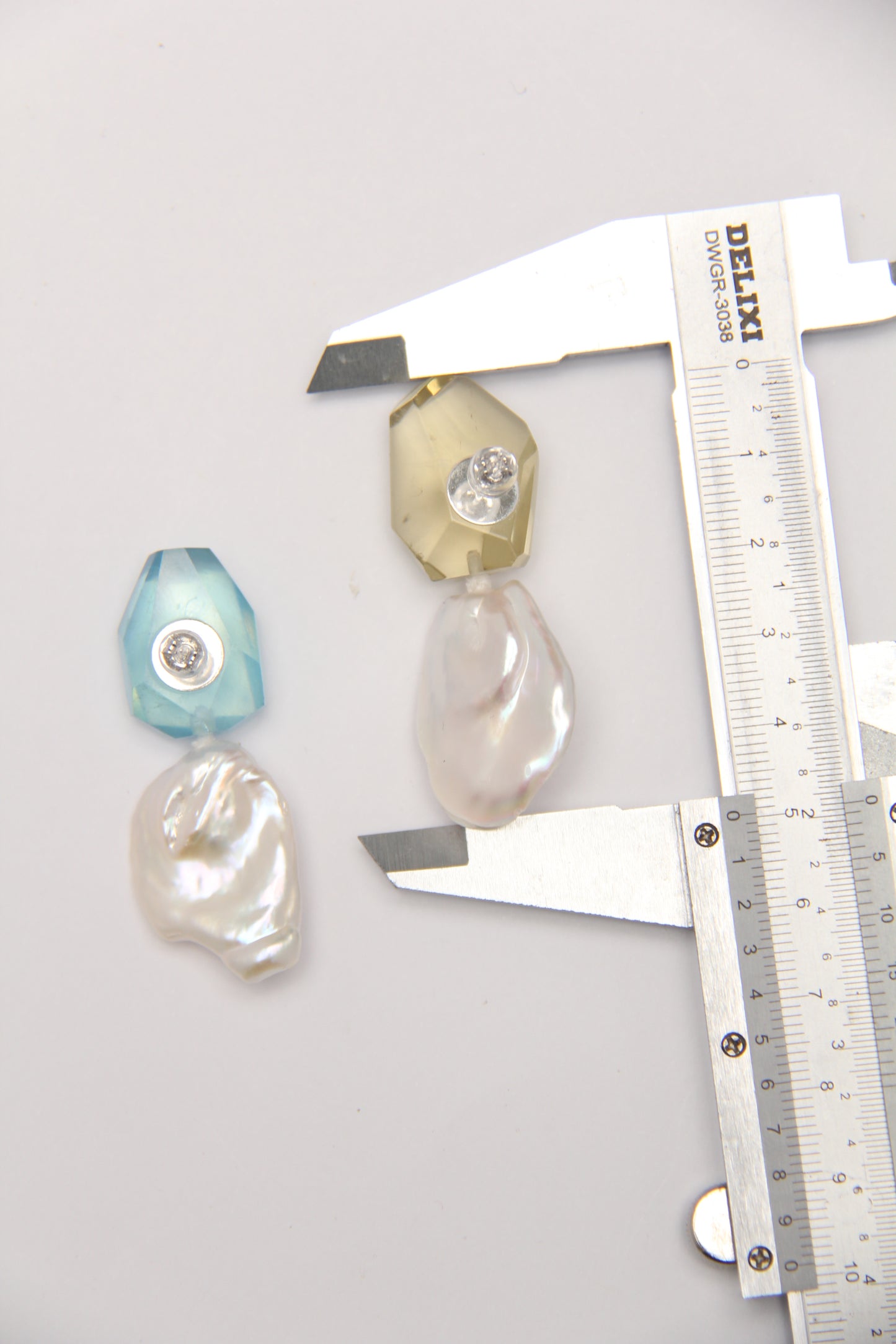 Earrings: pearls, aquamarine, citrine