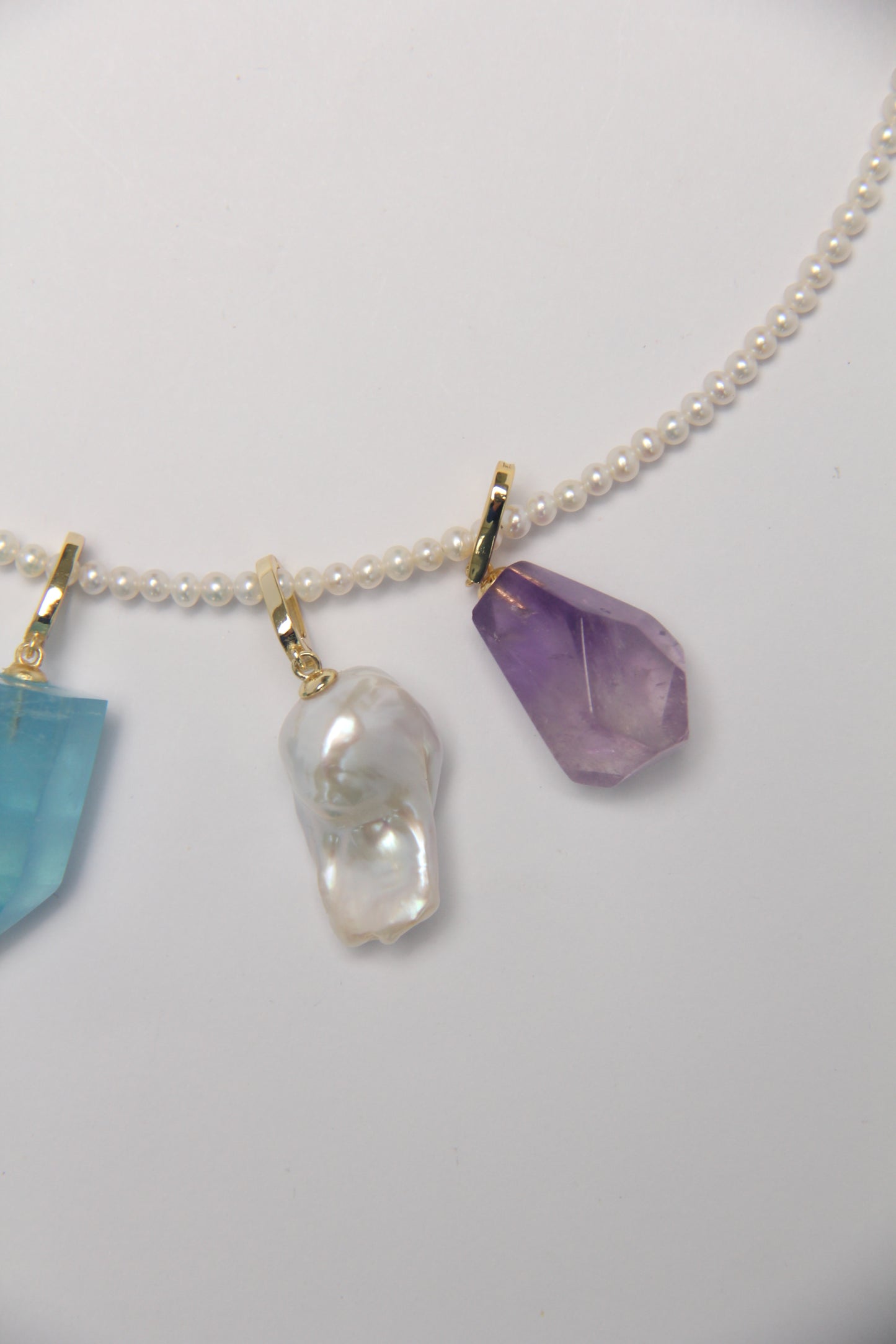 Charms: citrine, aquamarine, pearls, amethyst