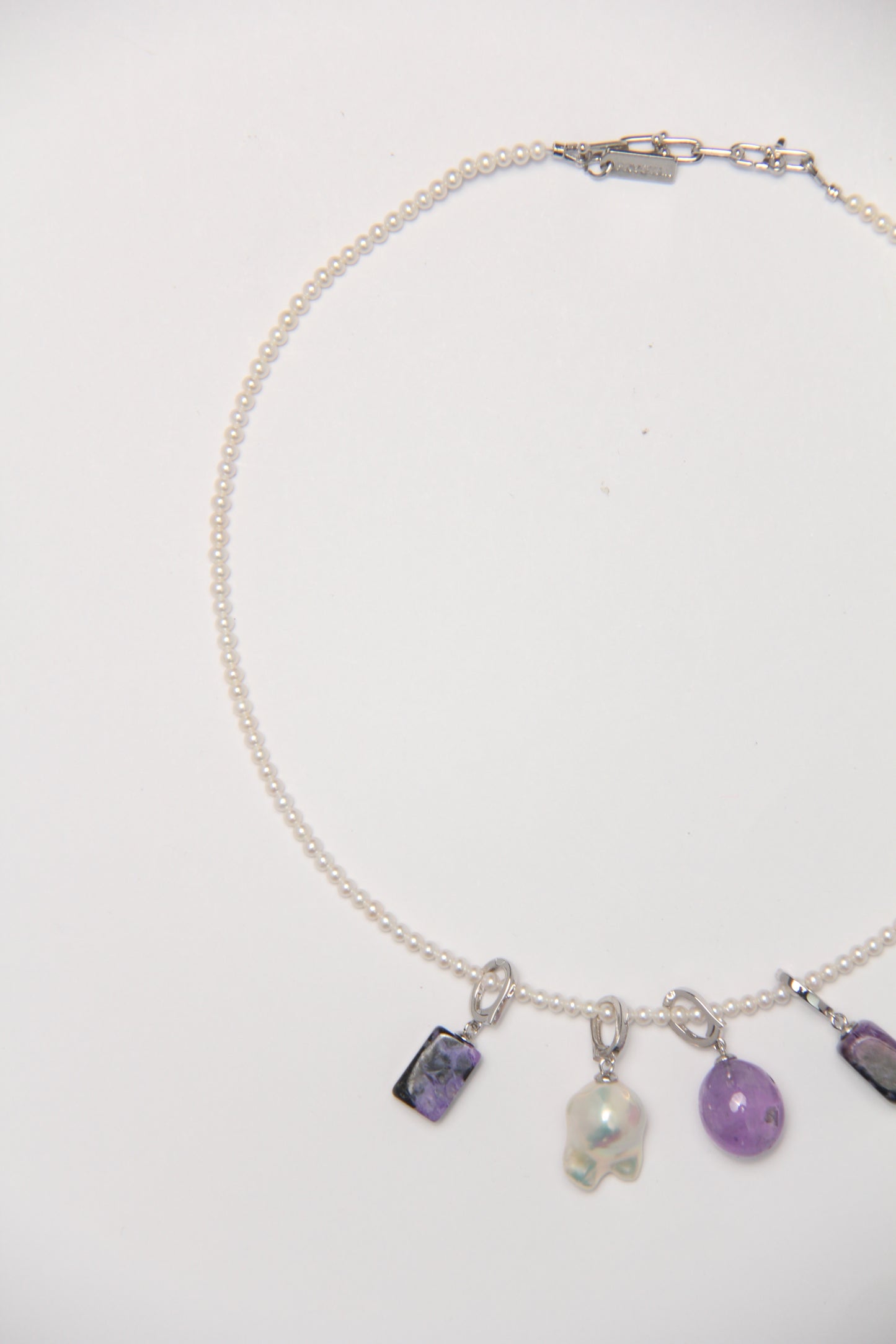 Charms: charoite, amethyst, pearls