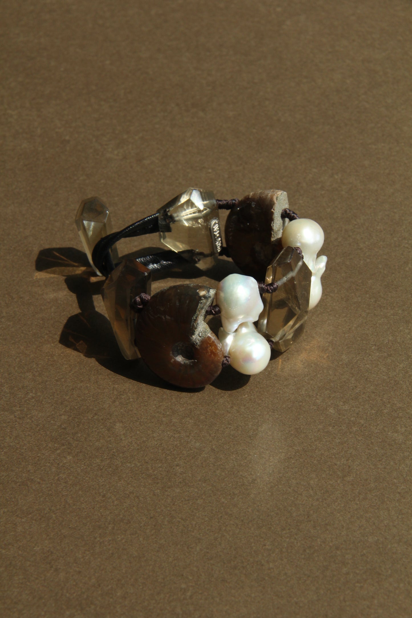 Bracelet: ammonite fossils, smoky quartz, pearls