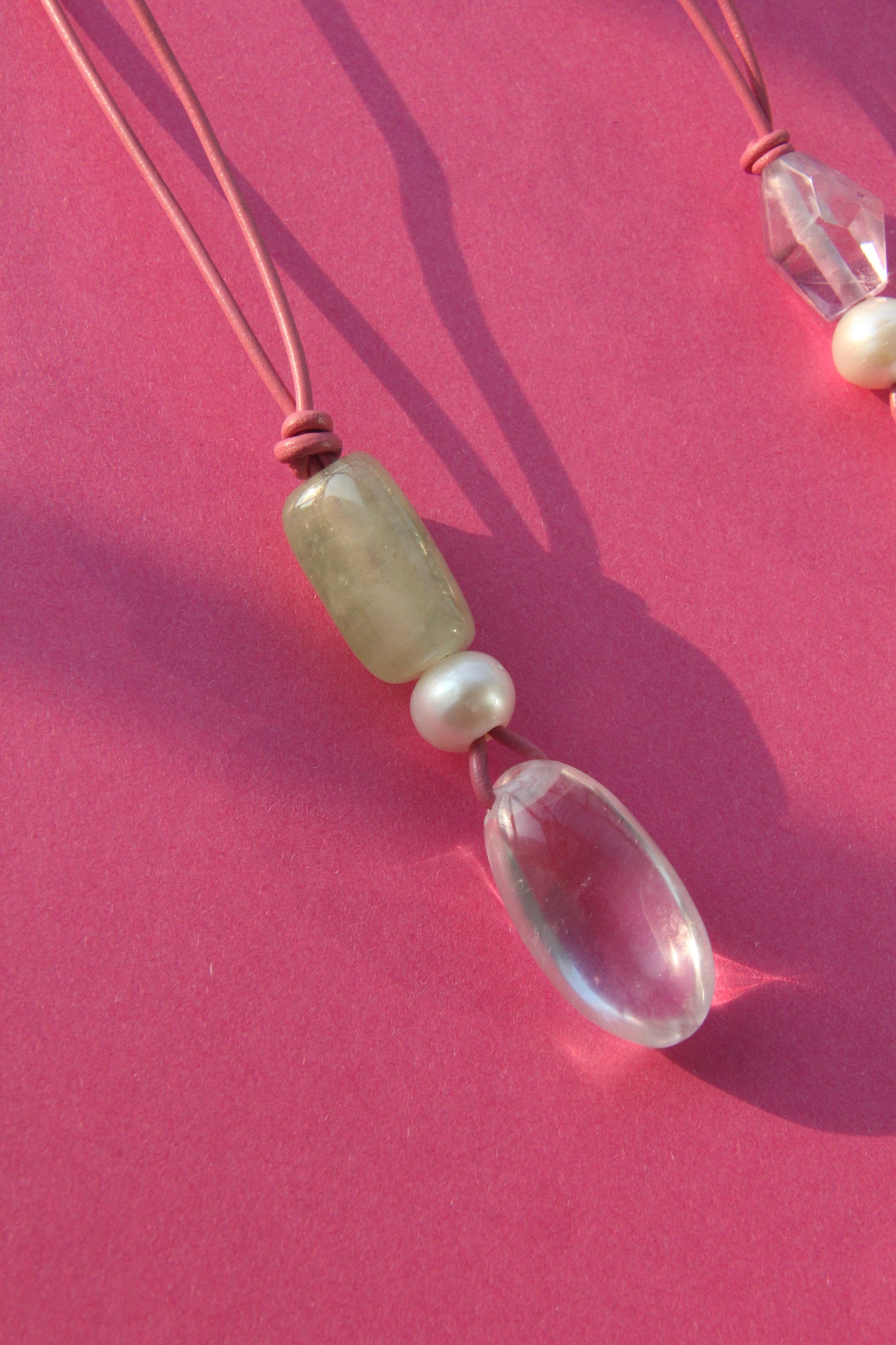 Pendant: morganite, pearl, quartz, leather