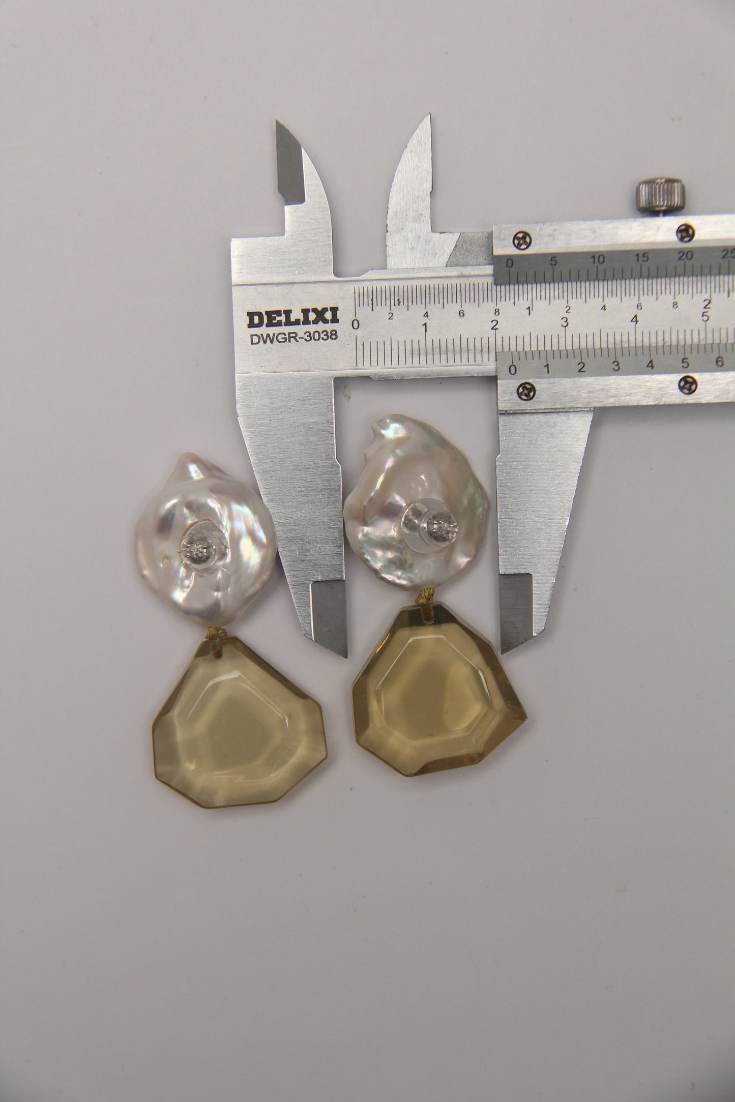 Earrings: pearls, citrine