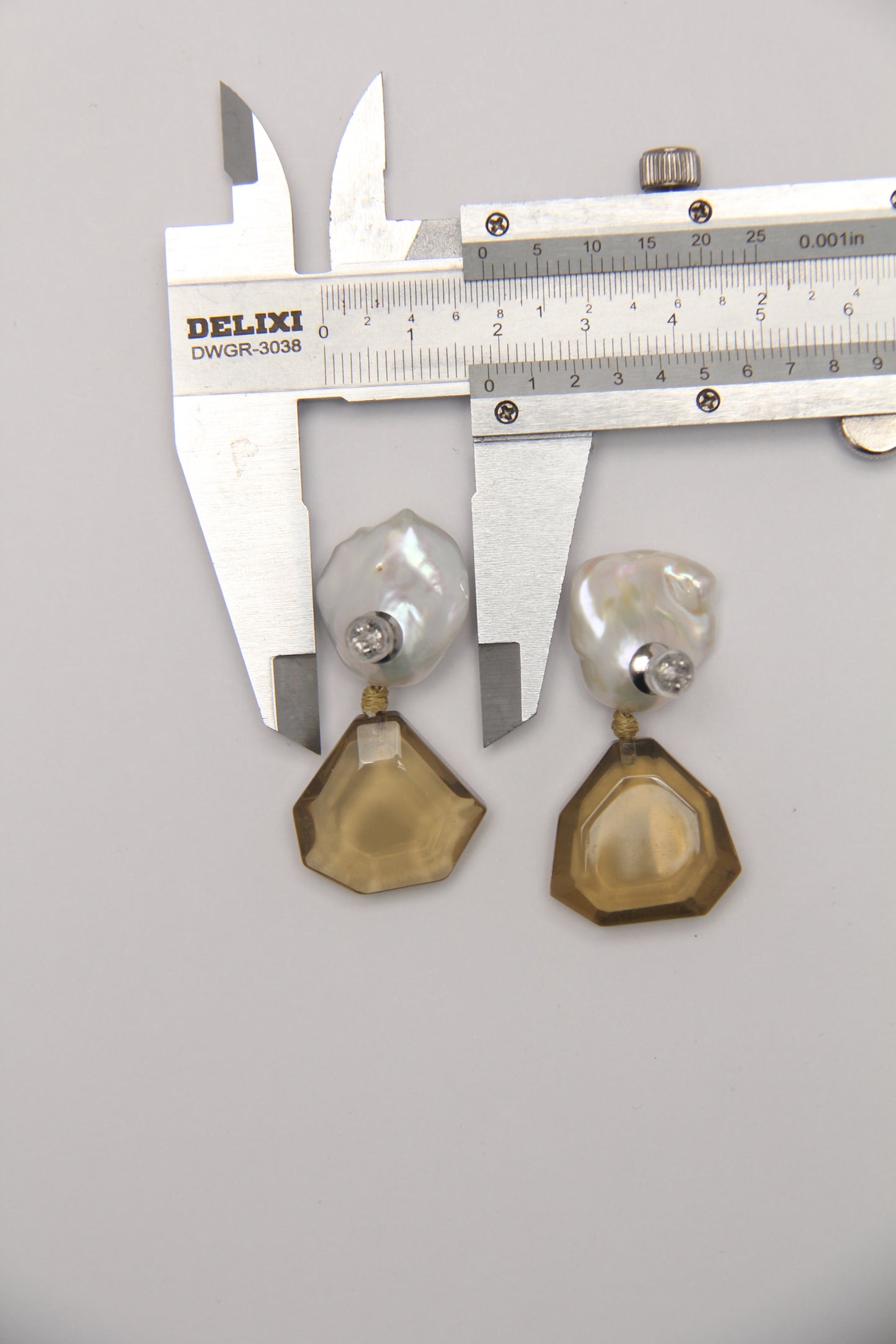 Earrings: pearls, citrine