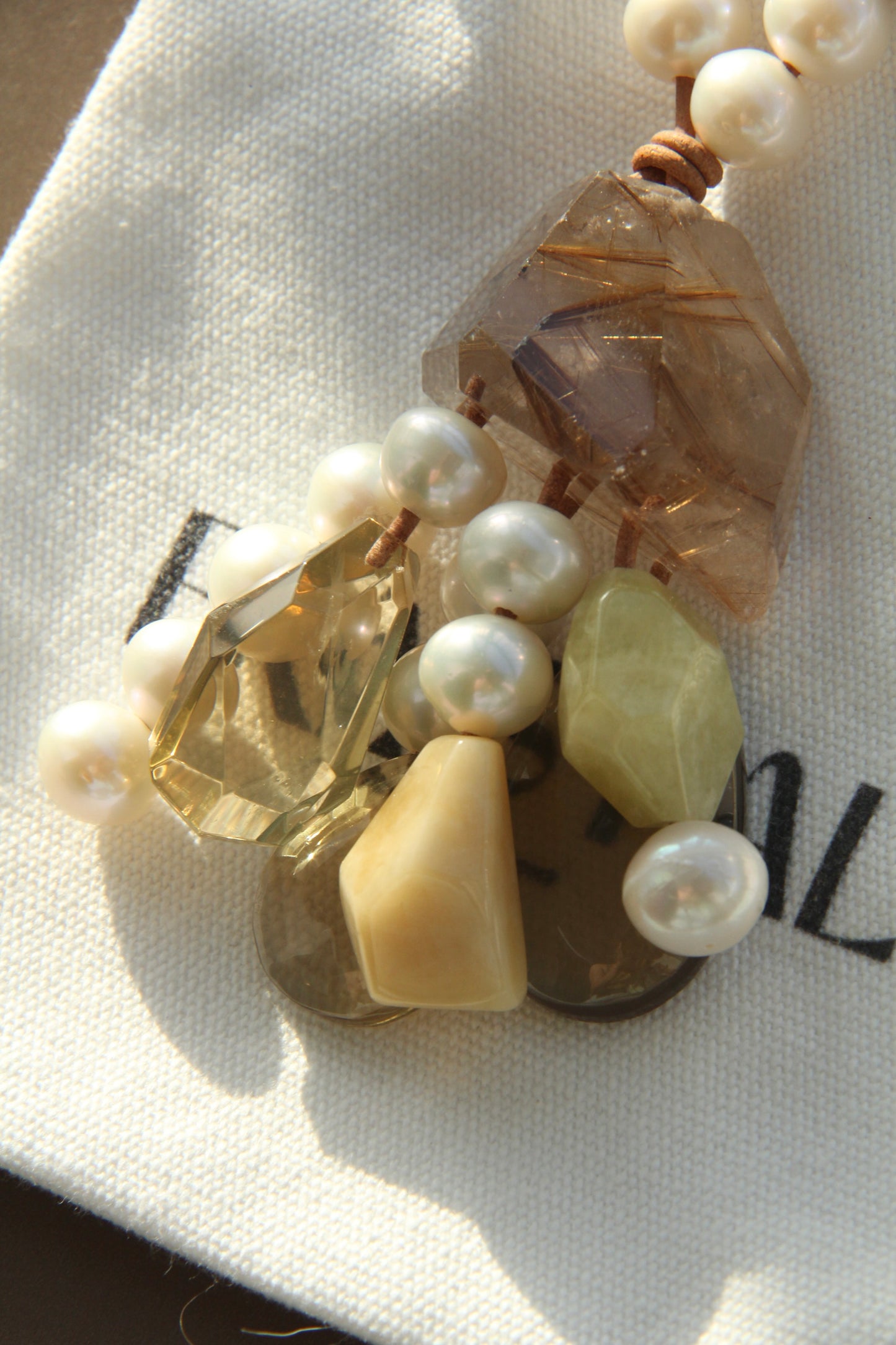 Pendant: golden rutilated quartz, pearls, morganite, citrine