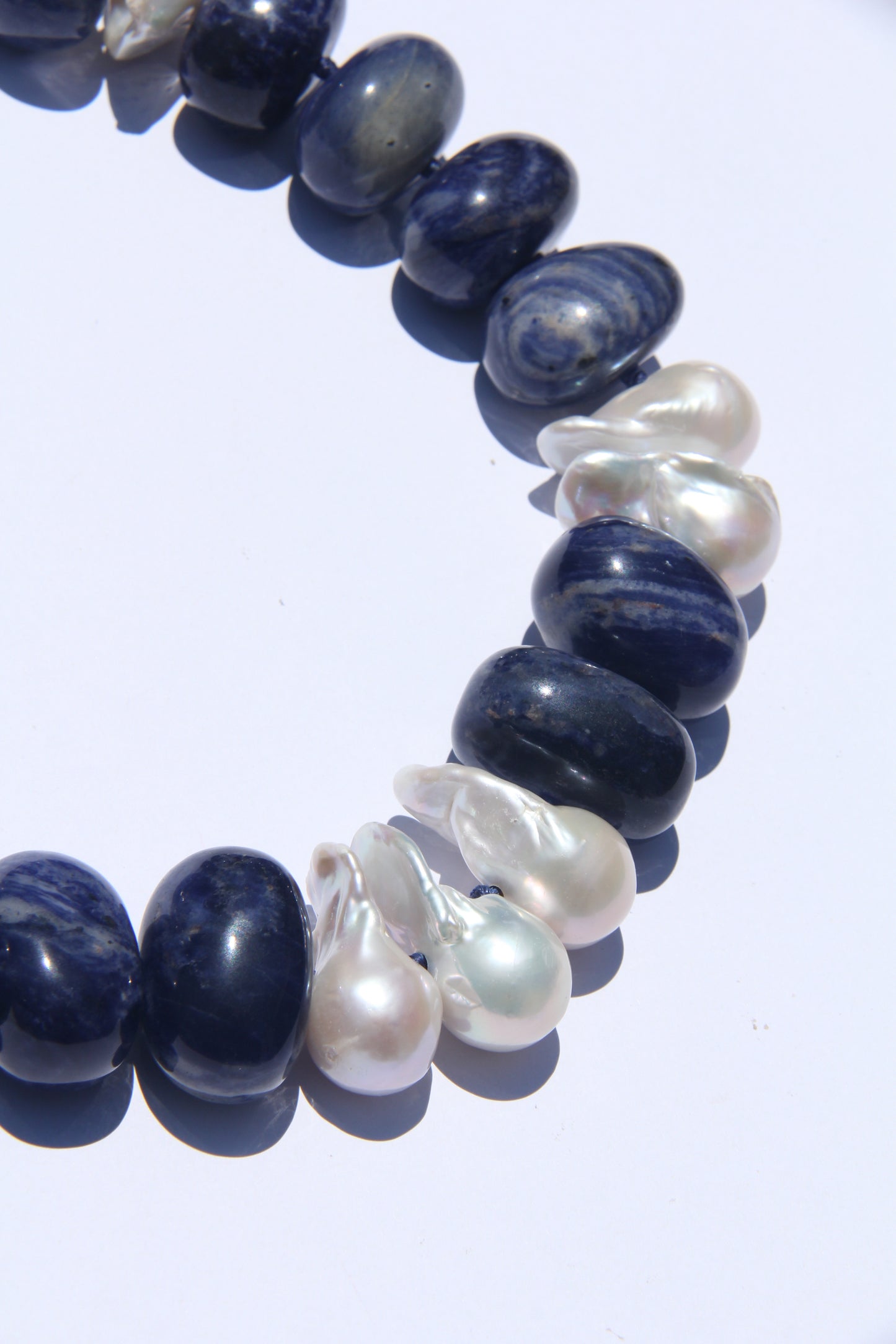 Necklace: pearls, blue vein stone