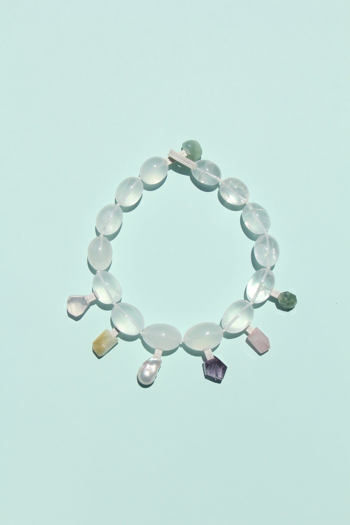 Charms: quartz, morganite, pearl, amethyst
