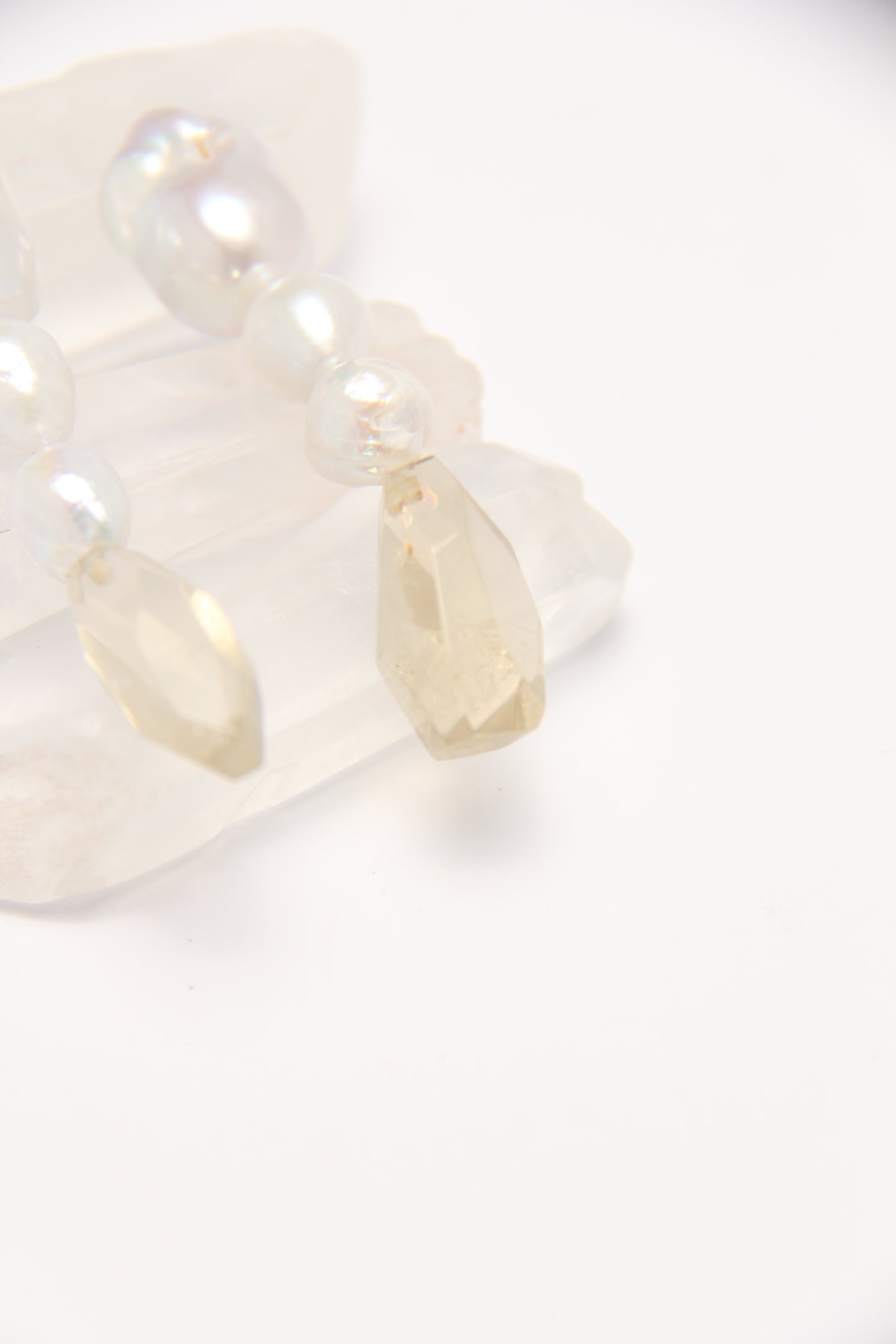 Earrings: pearls, citrine