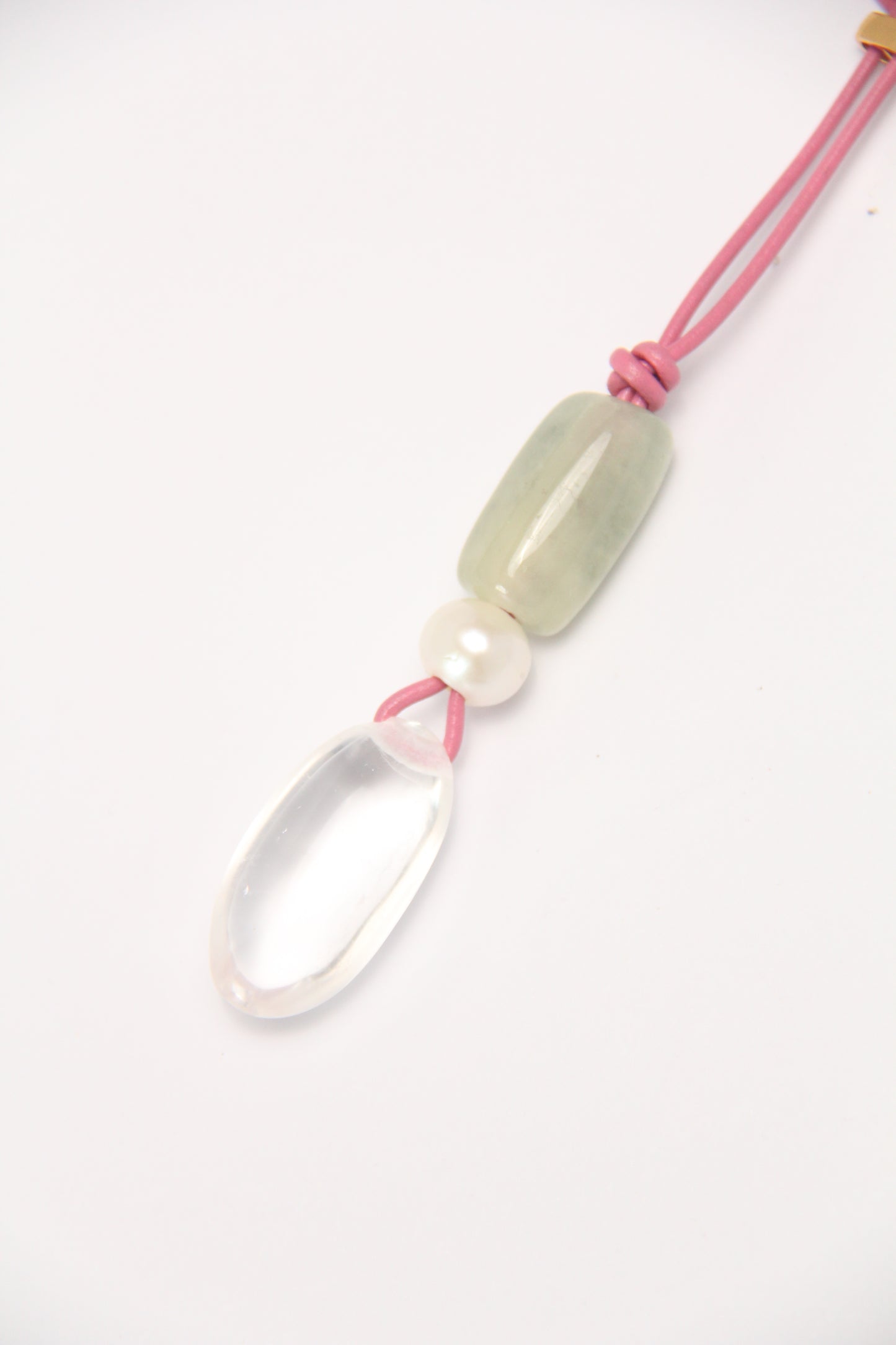 Pendant: morganite, pearl, quartz, leather