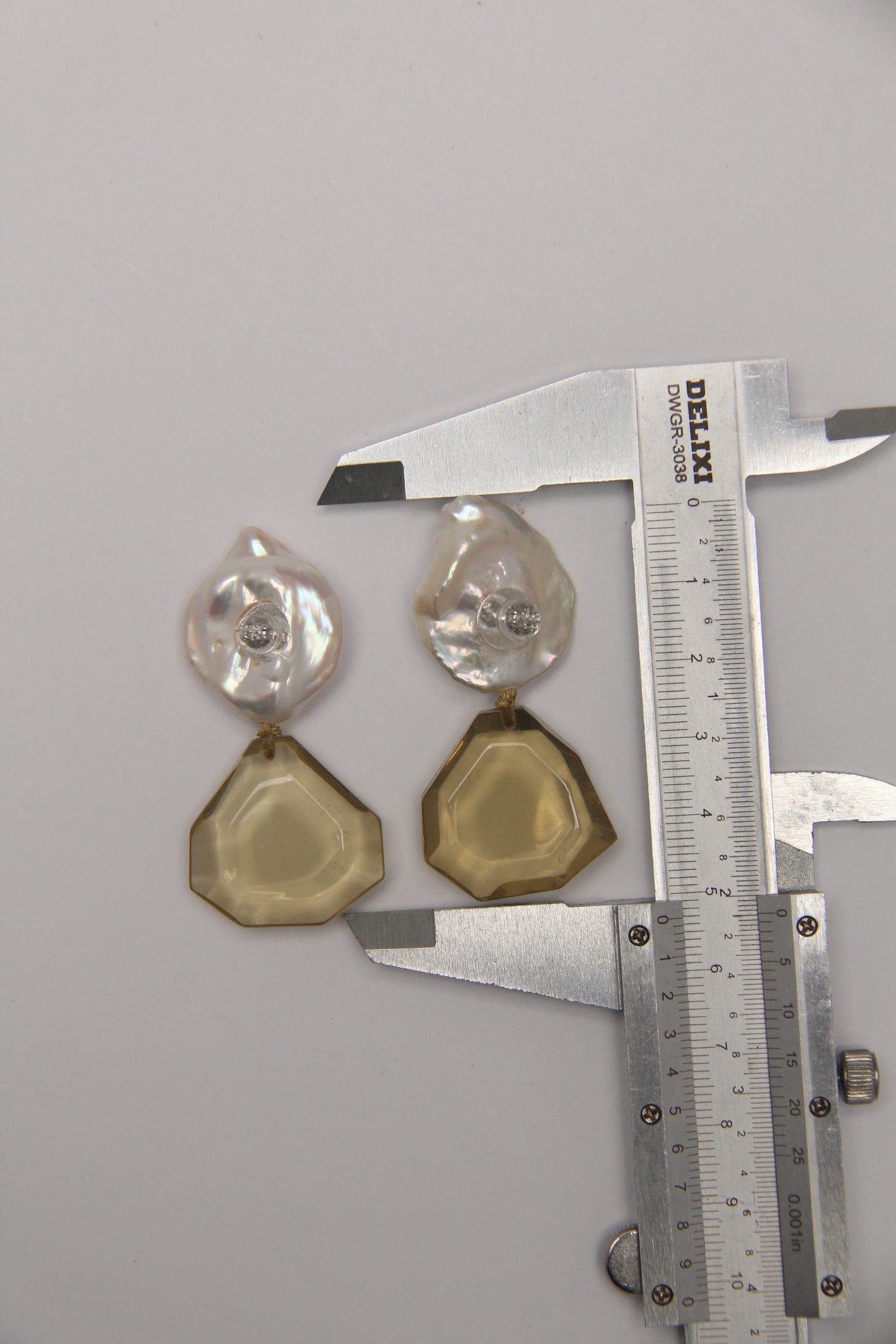 Earrings: pearls, citrine