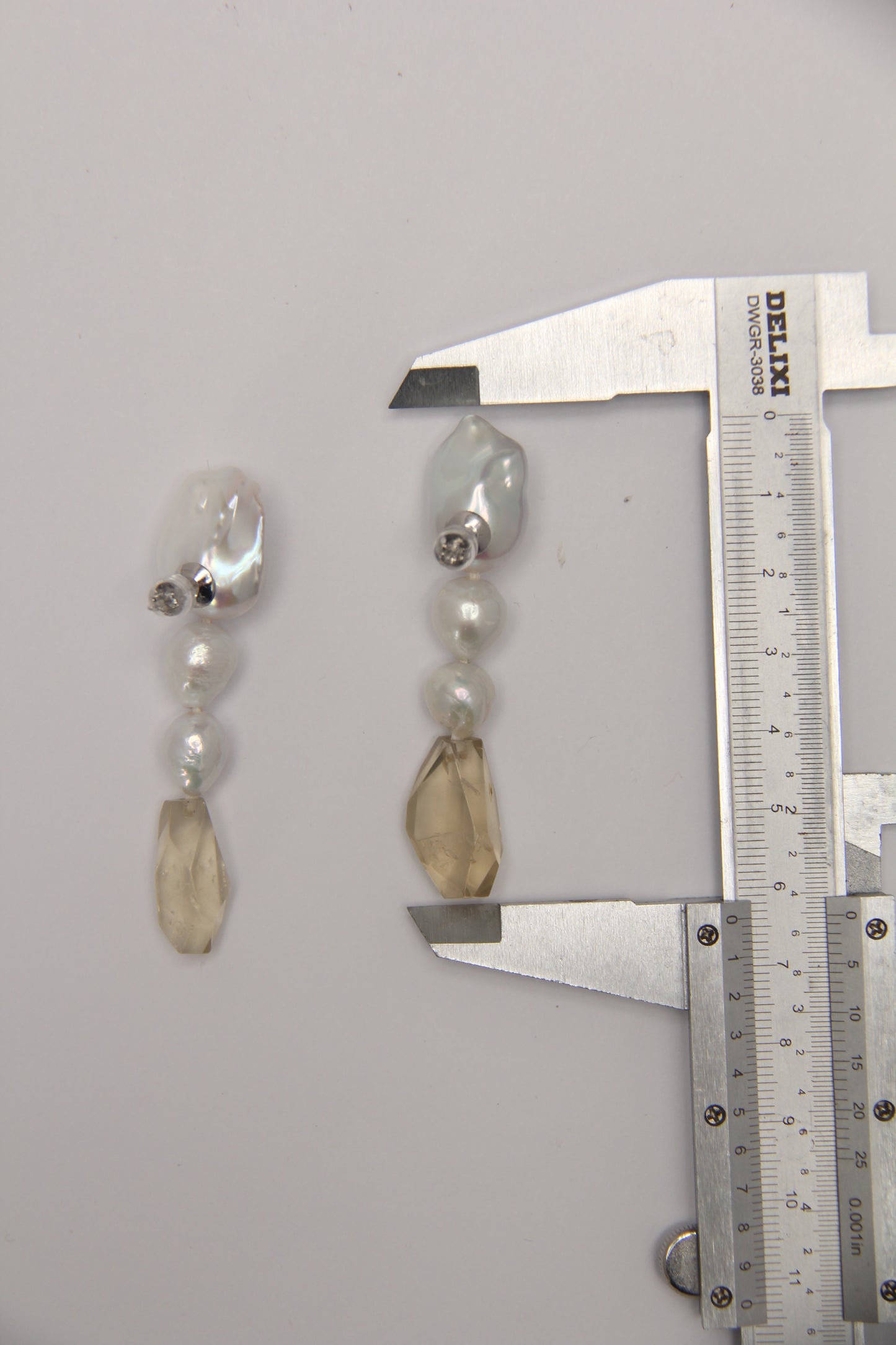 Earrings: pearls, citrine