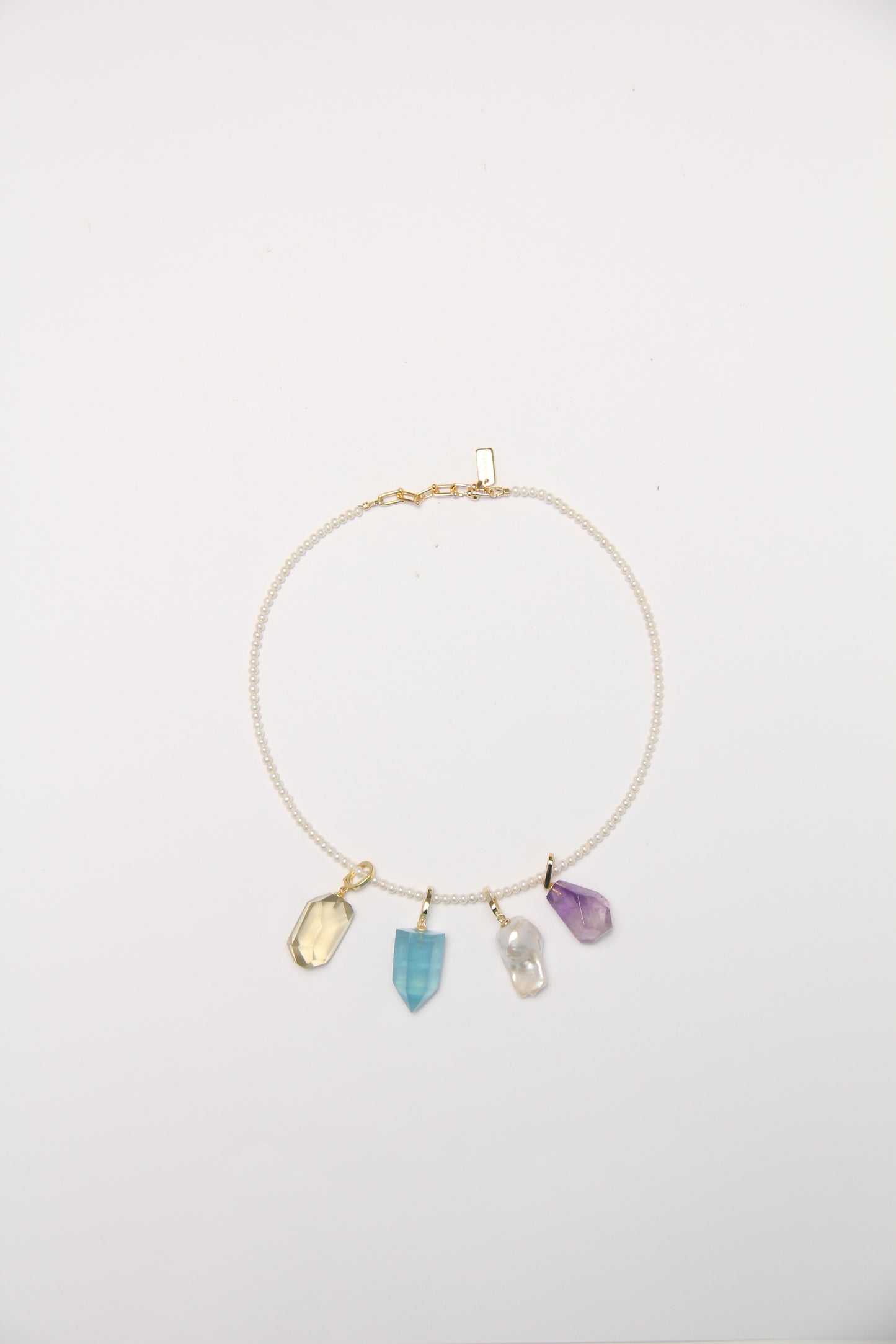 Charms: citrine, aquamarine, pearls, amethyst