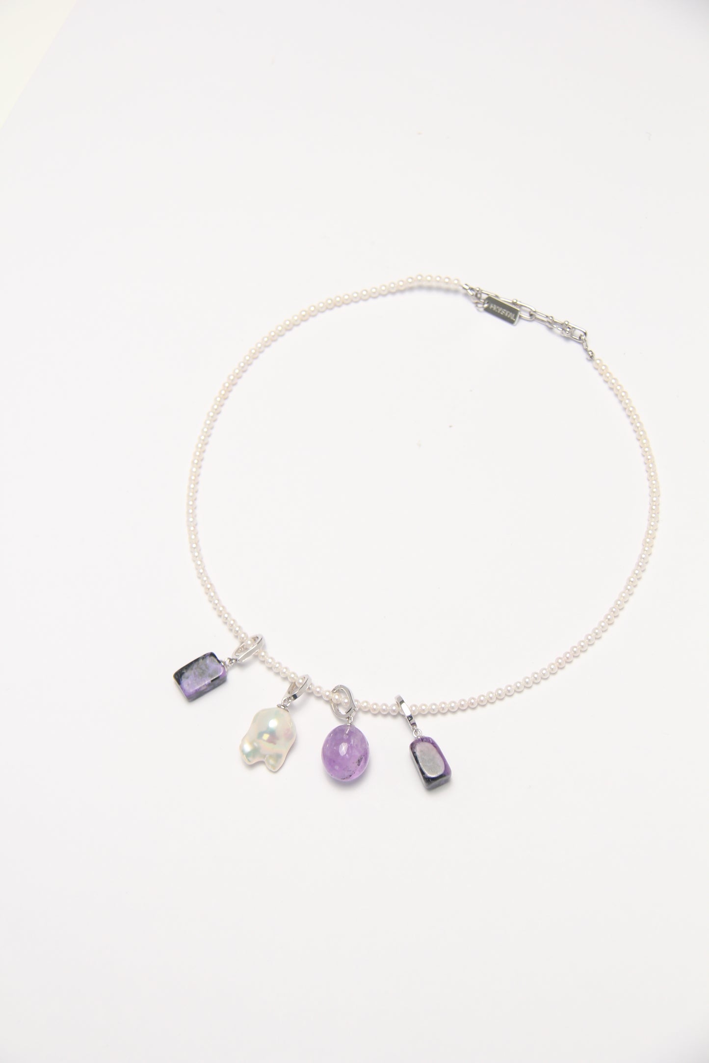 Charms: charoite, amethyst, pearls