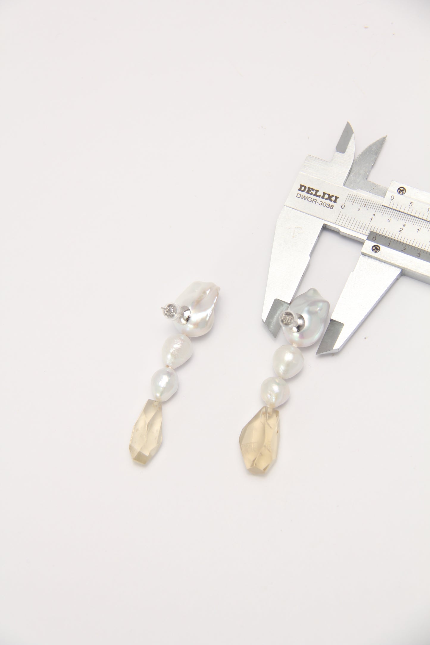 Earrings: pearls, citrine