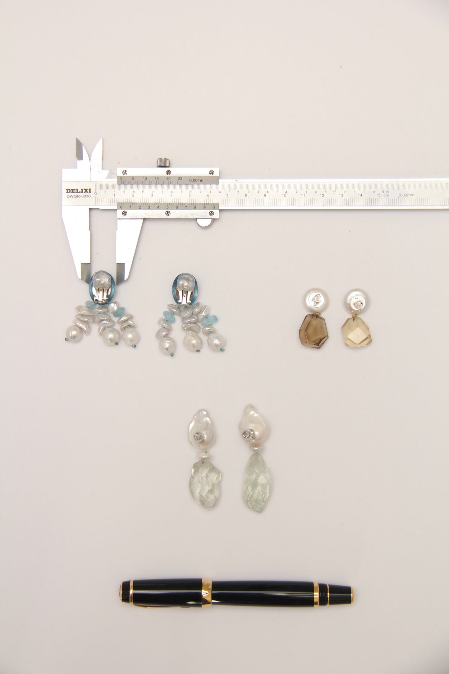 Earrings: pearls, prasem quartz