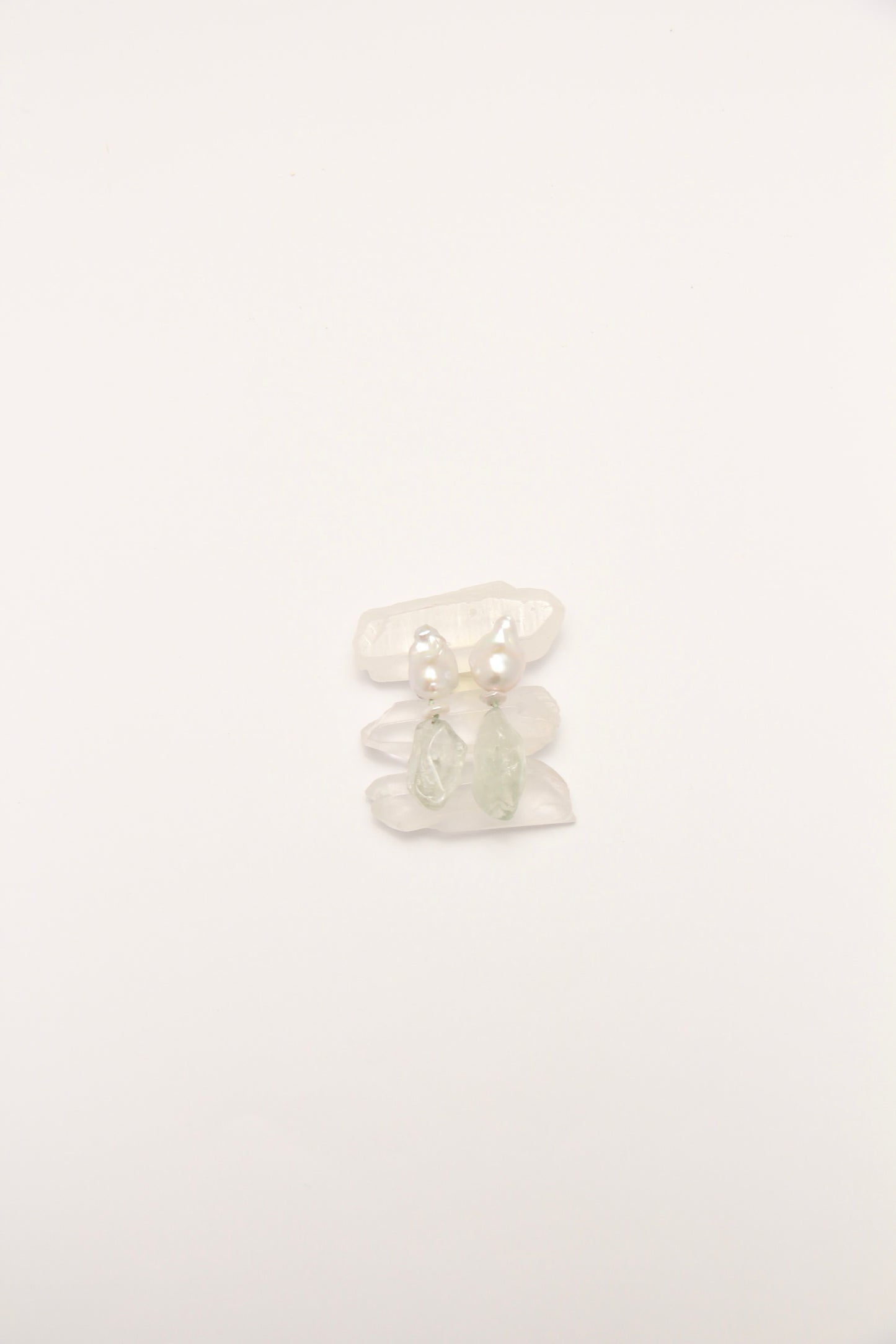 Earrings: pearls, prasem quartz