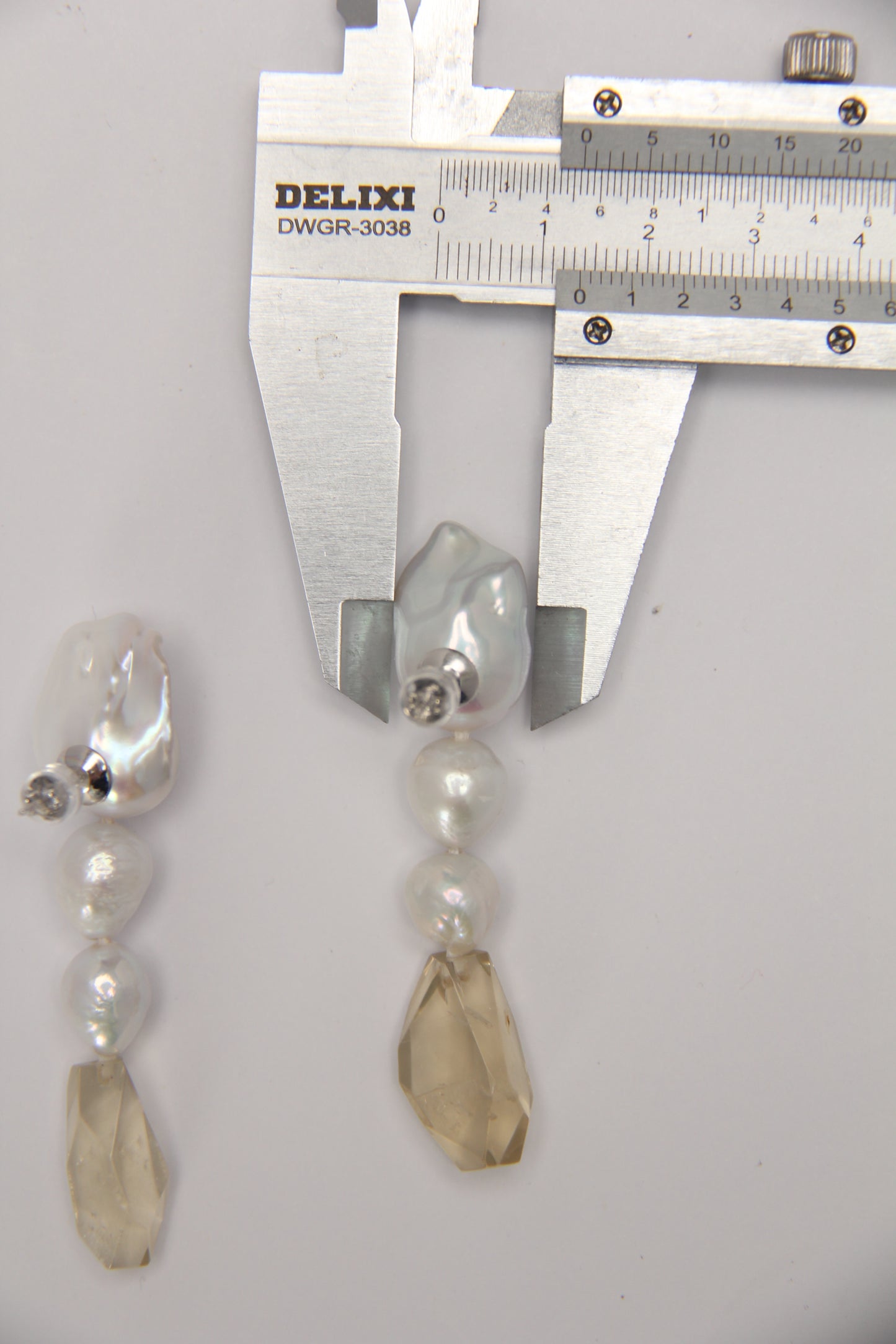Earrings: pearls, citrine
