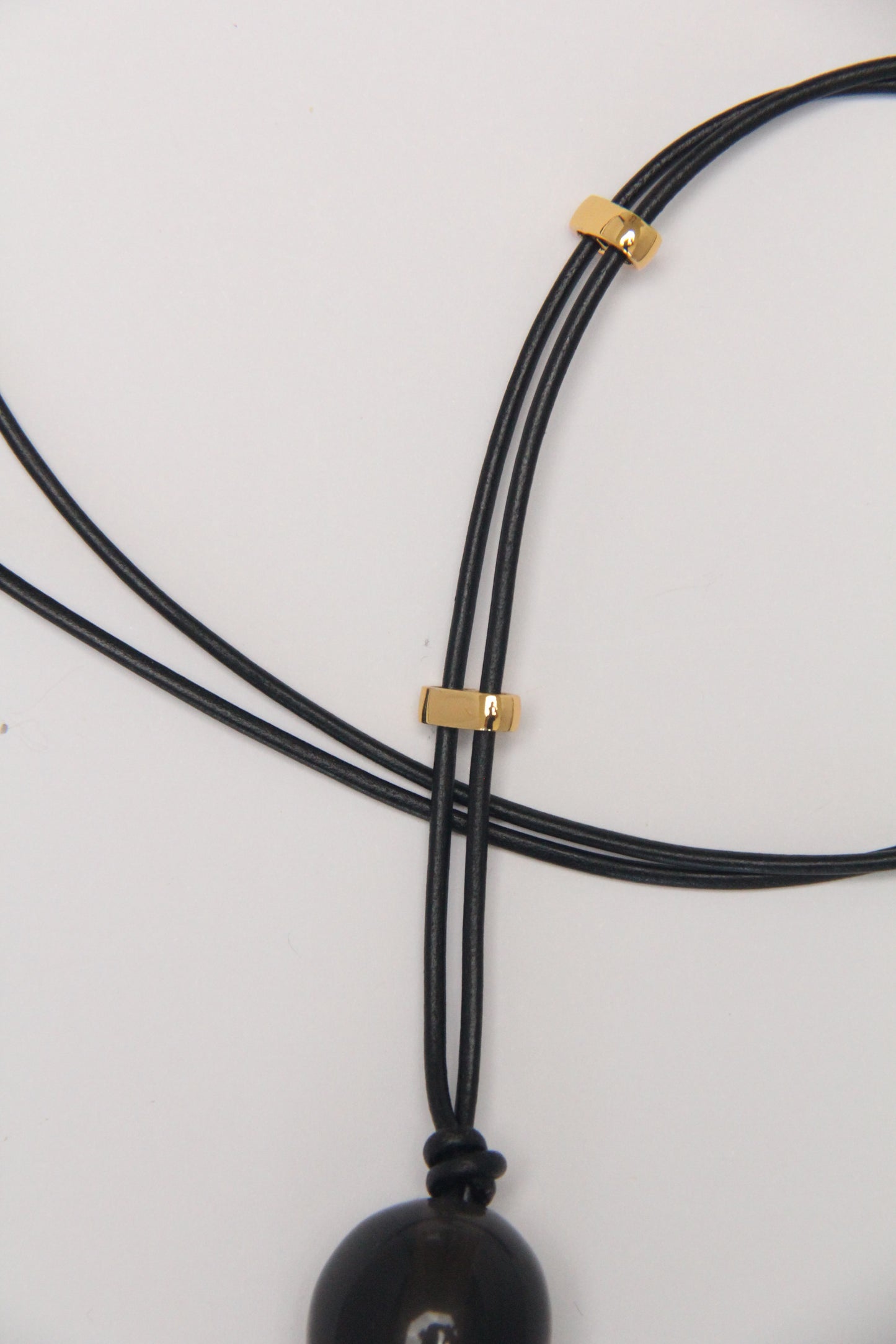 Pendant: obsidian, pearls, chalcopyrite