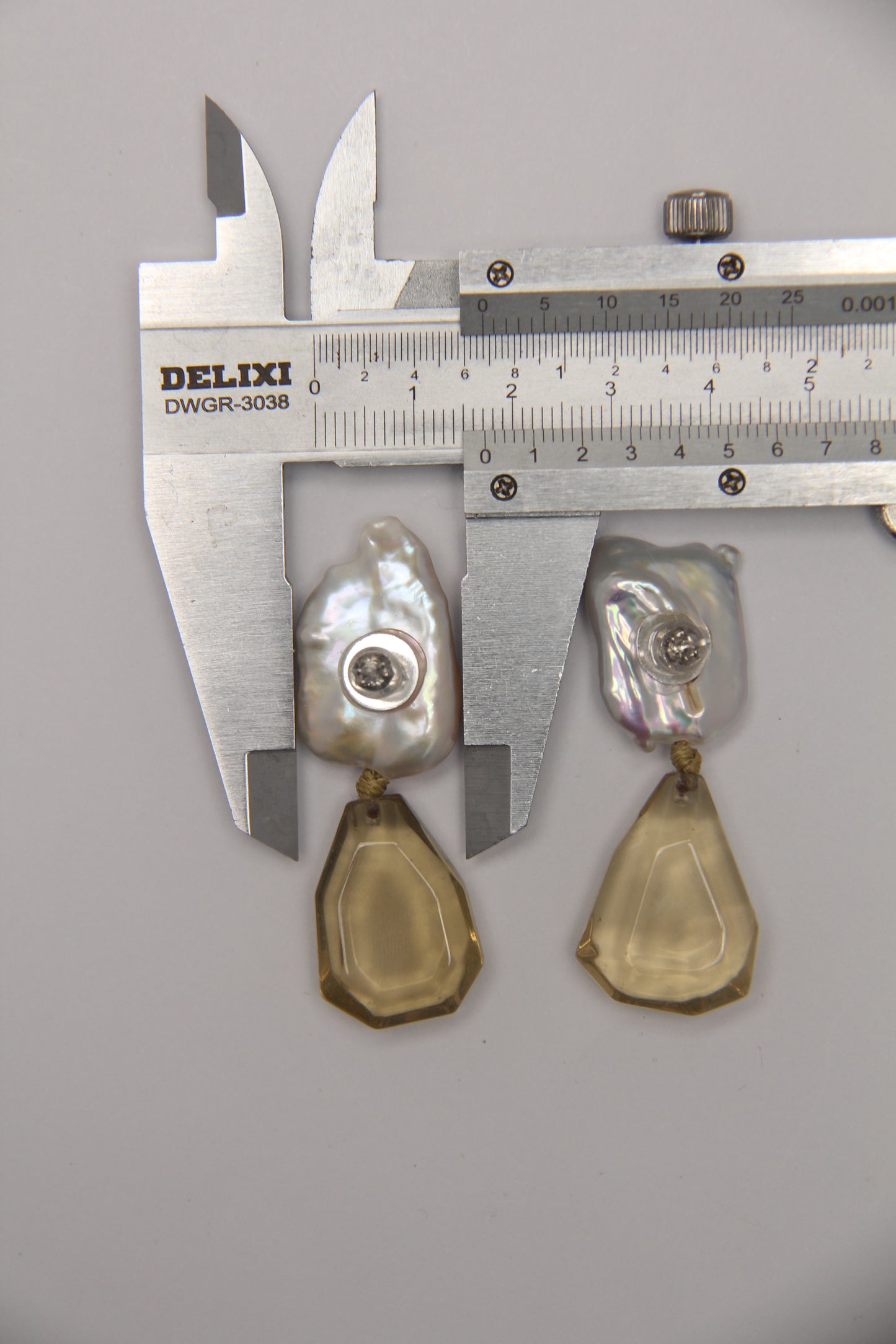 Earrings: pearls, citrine