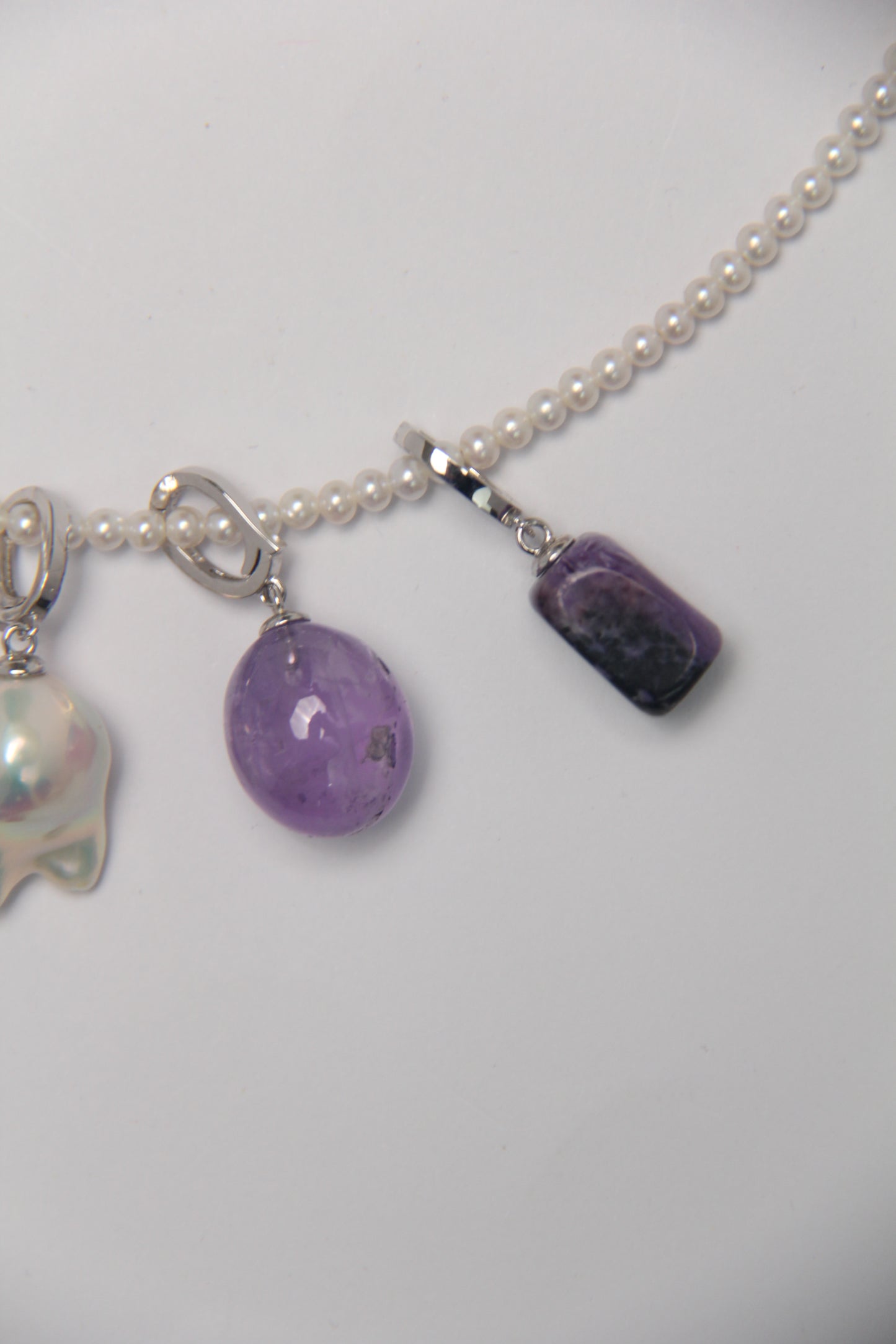 Charms: charoite, amethyst, pearls
