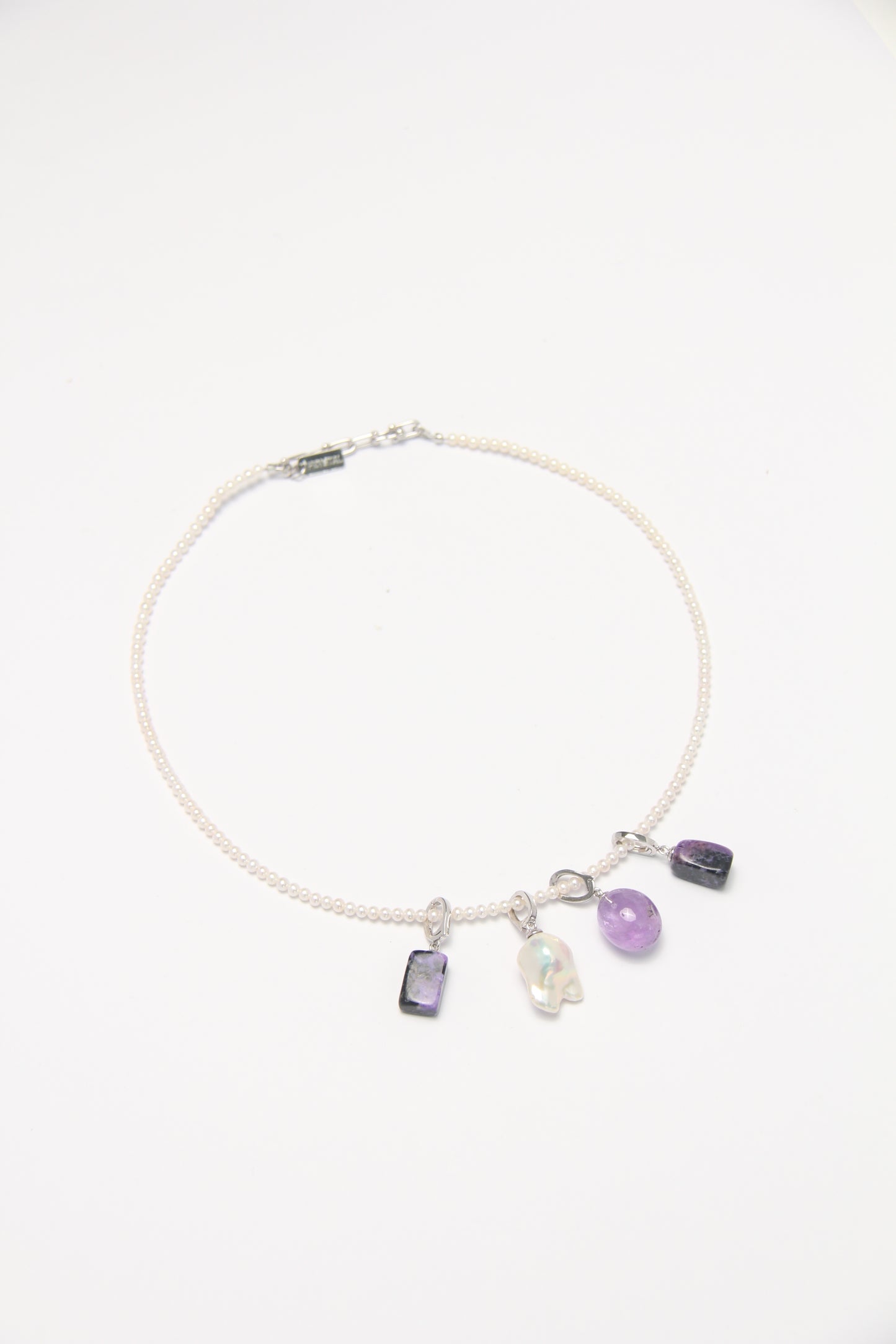 Charms: charoite, amethyst, pearls