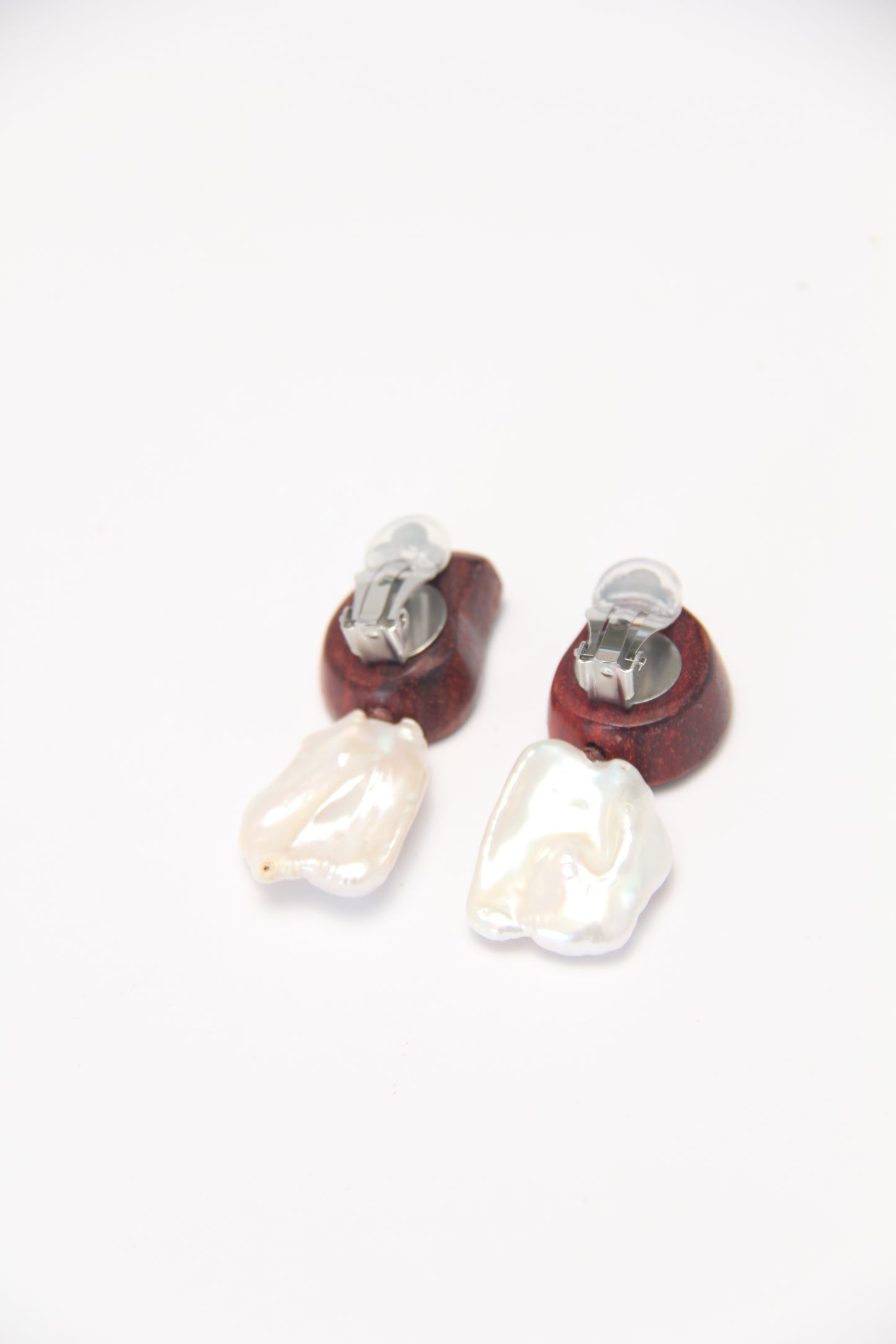 Earrings: ammonite, Zambia blood wood, pearls