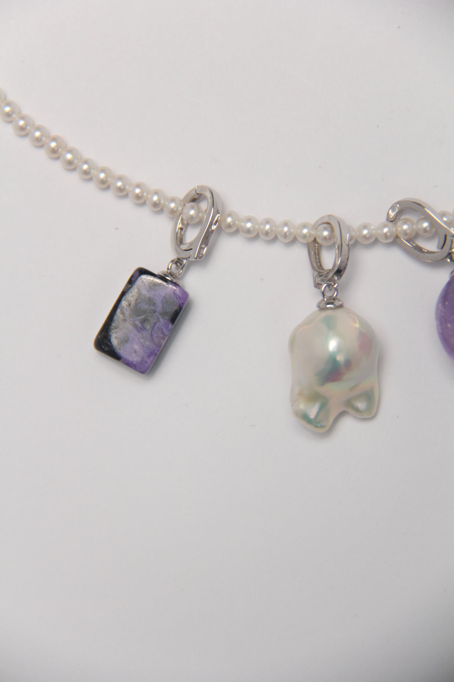 Charms: charoite, amethyst, pearls
