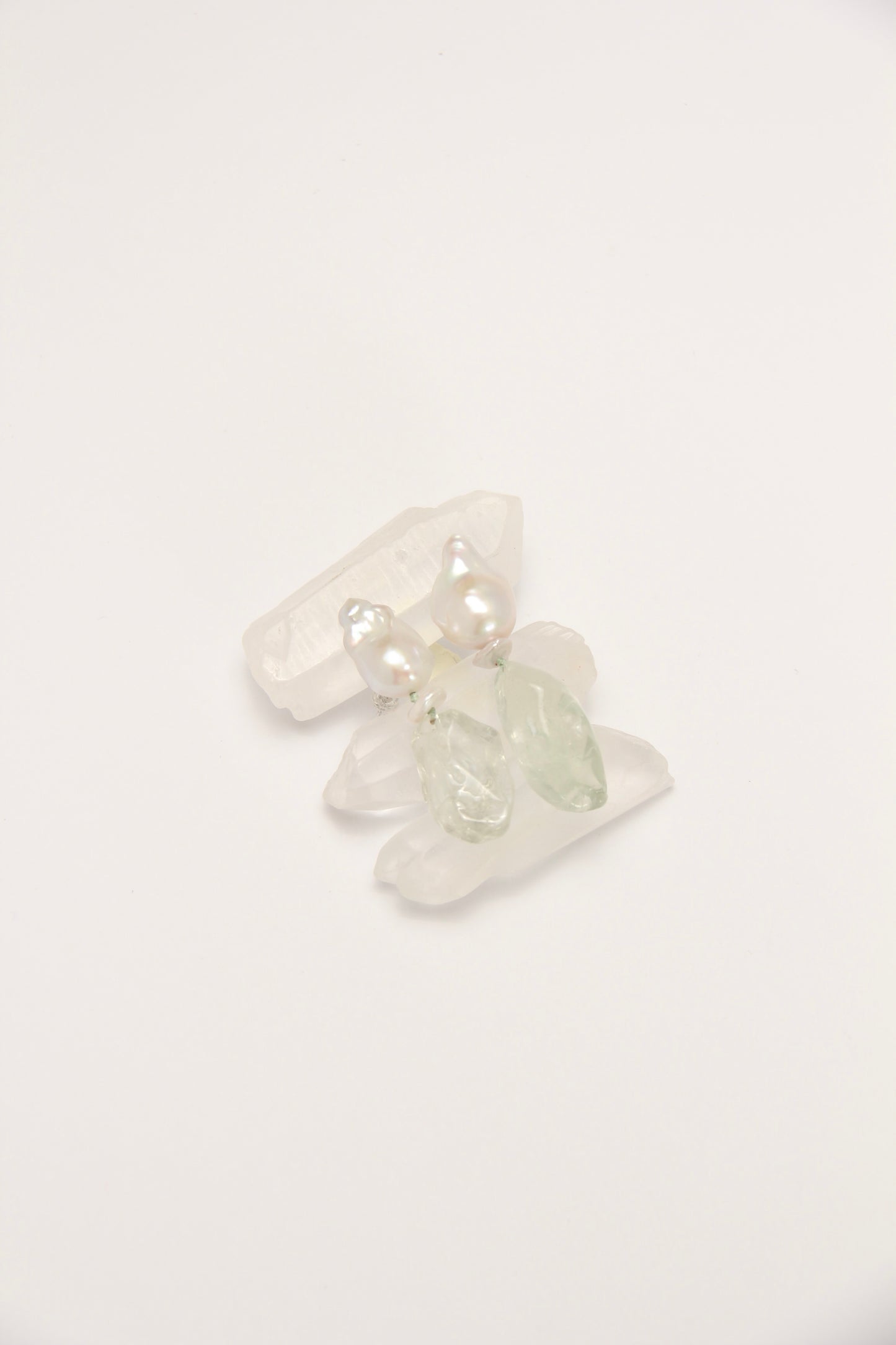 Earrings: pearls, prasem quartz