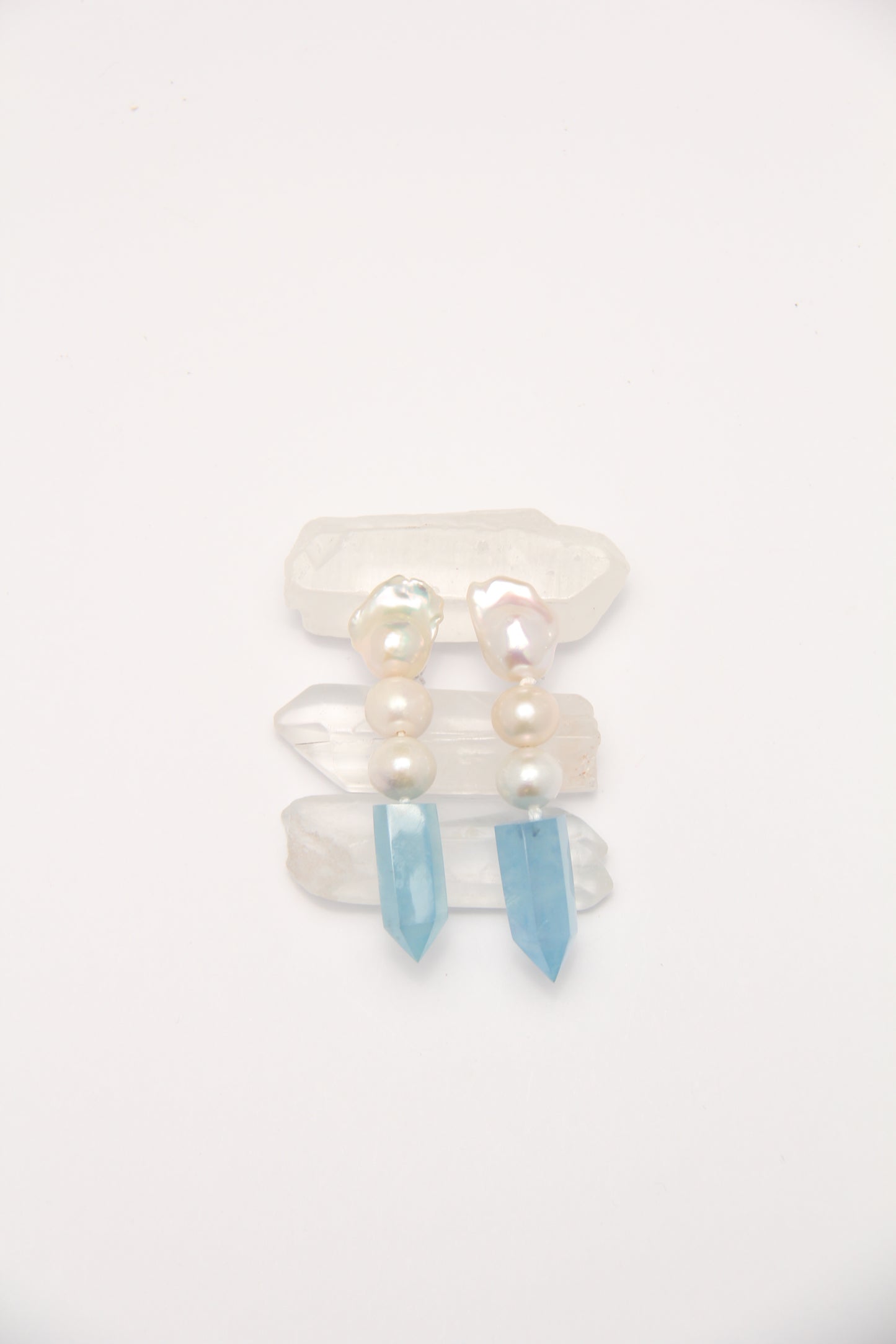 Earrings: pearls, aquamarine