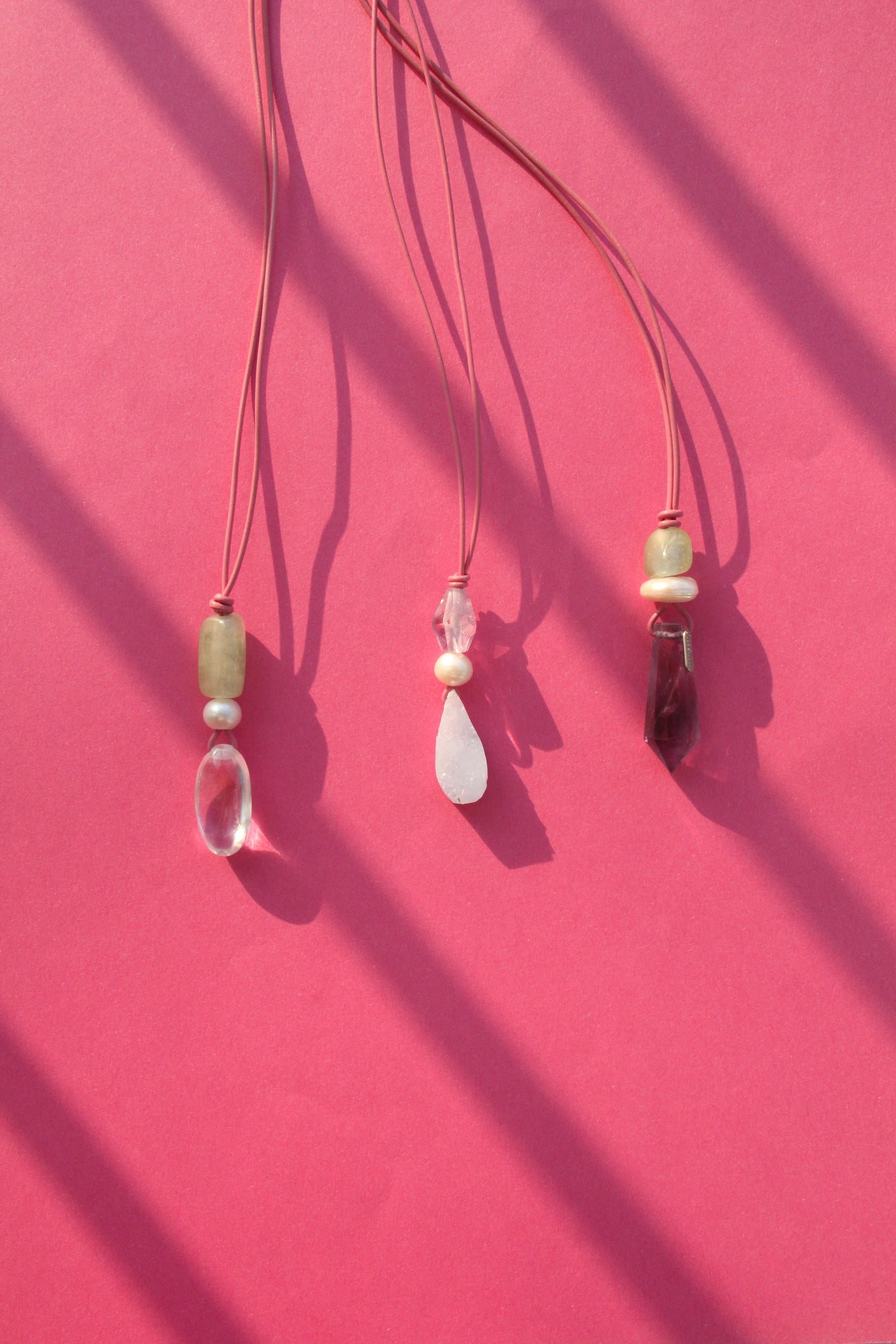 Pendant: amethyst, pearl, blue lace agate, leather