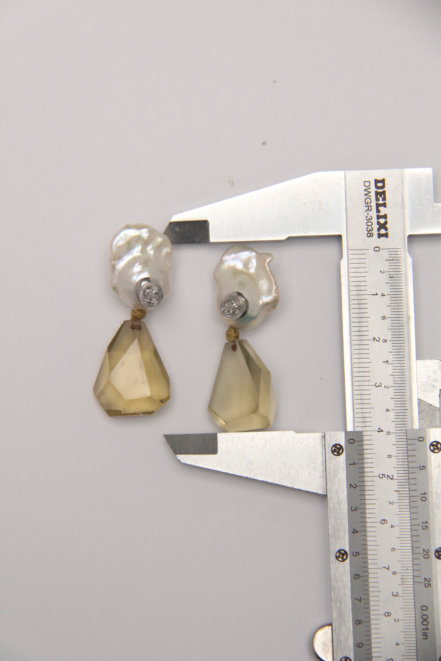Earrings: pearls, citrine