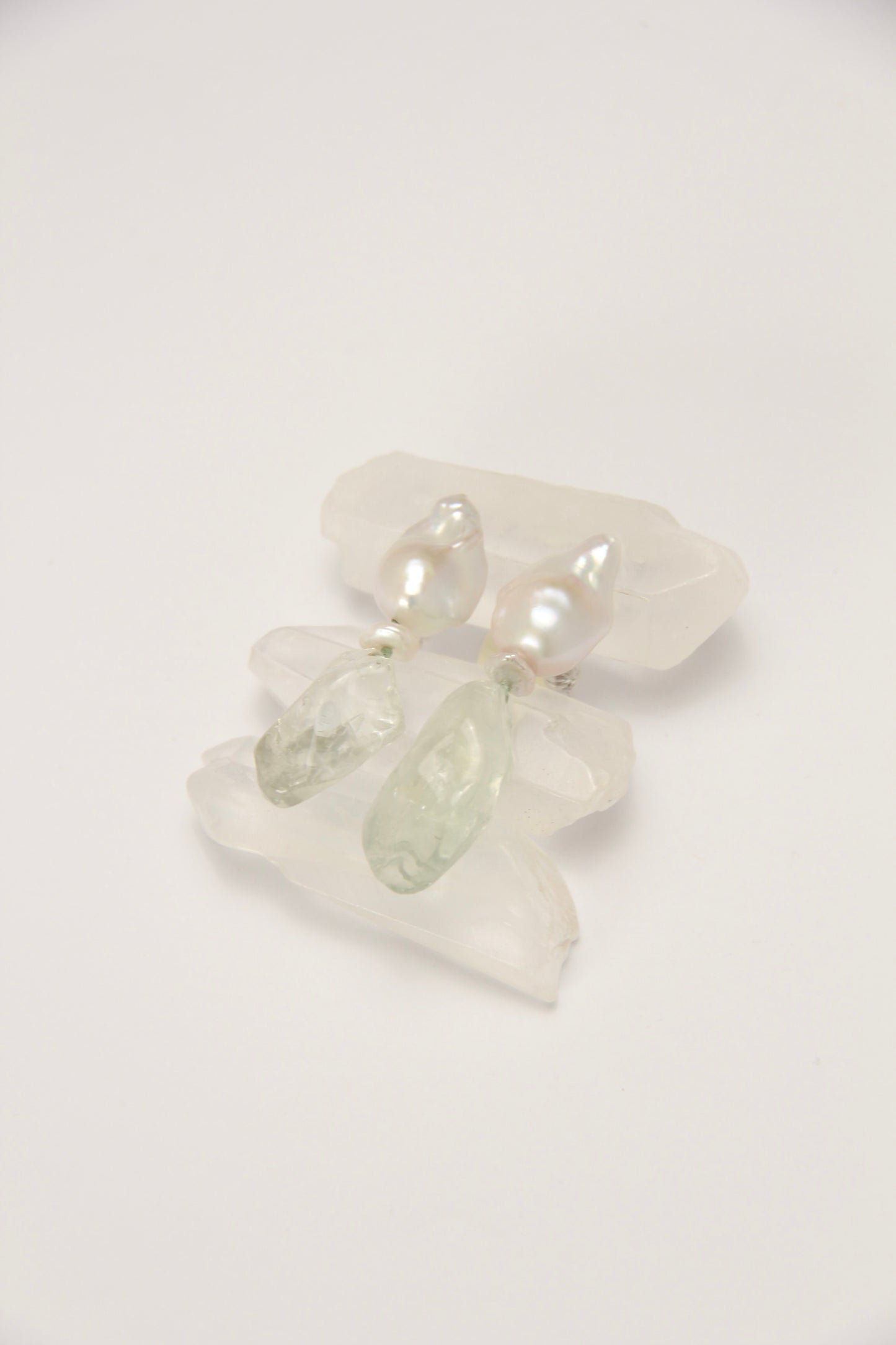 Earrings: pearls, prasem quartz