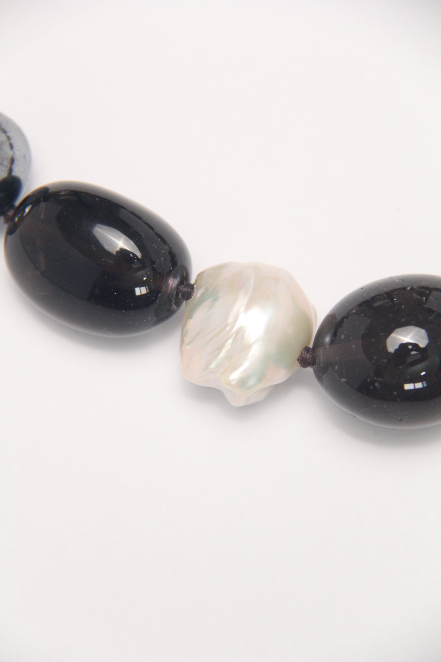 Necklace: smoky quartz, titanium magnet, pearls