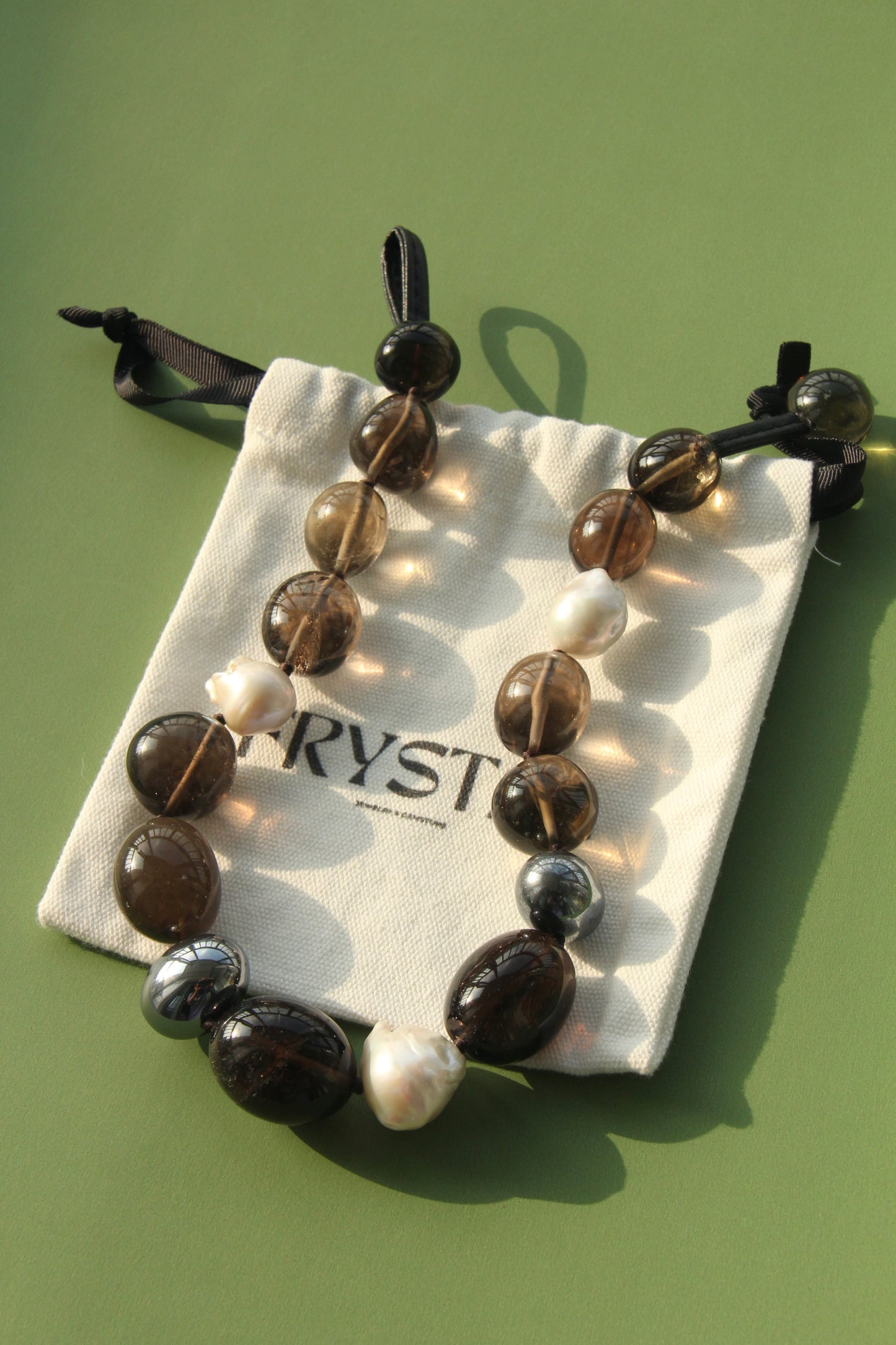 Necklace: smoky quartz, titanium magnet, pearls