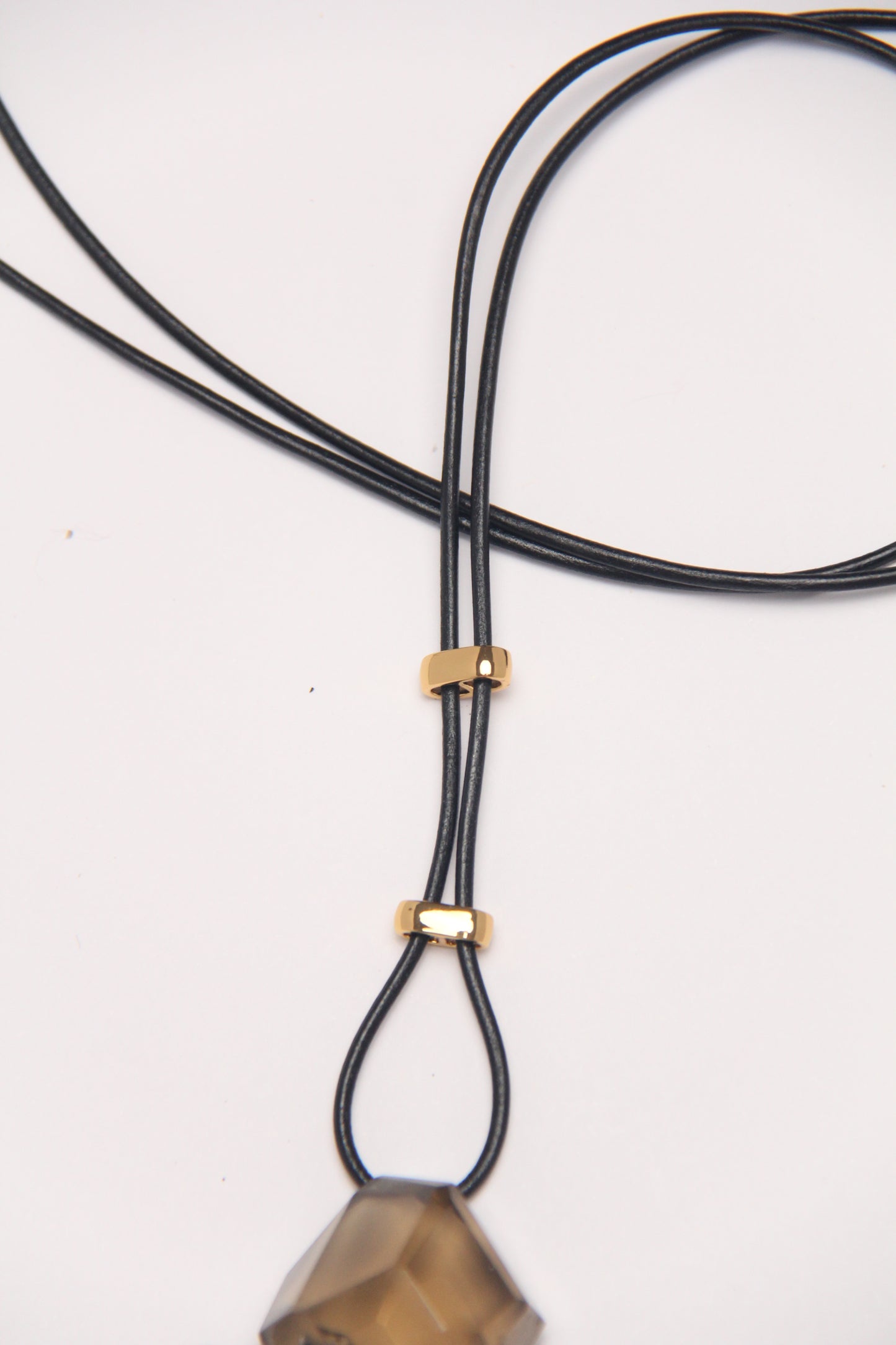 Pendant: shark tooth fossil, citrine, leather