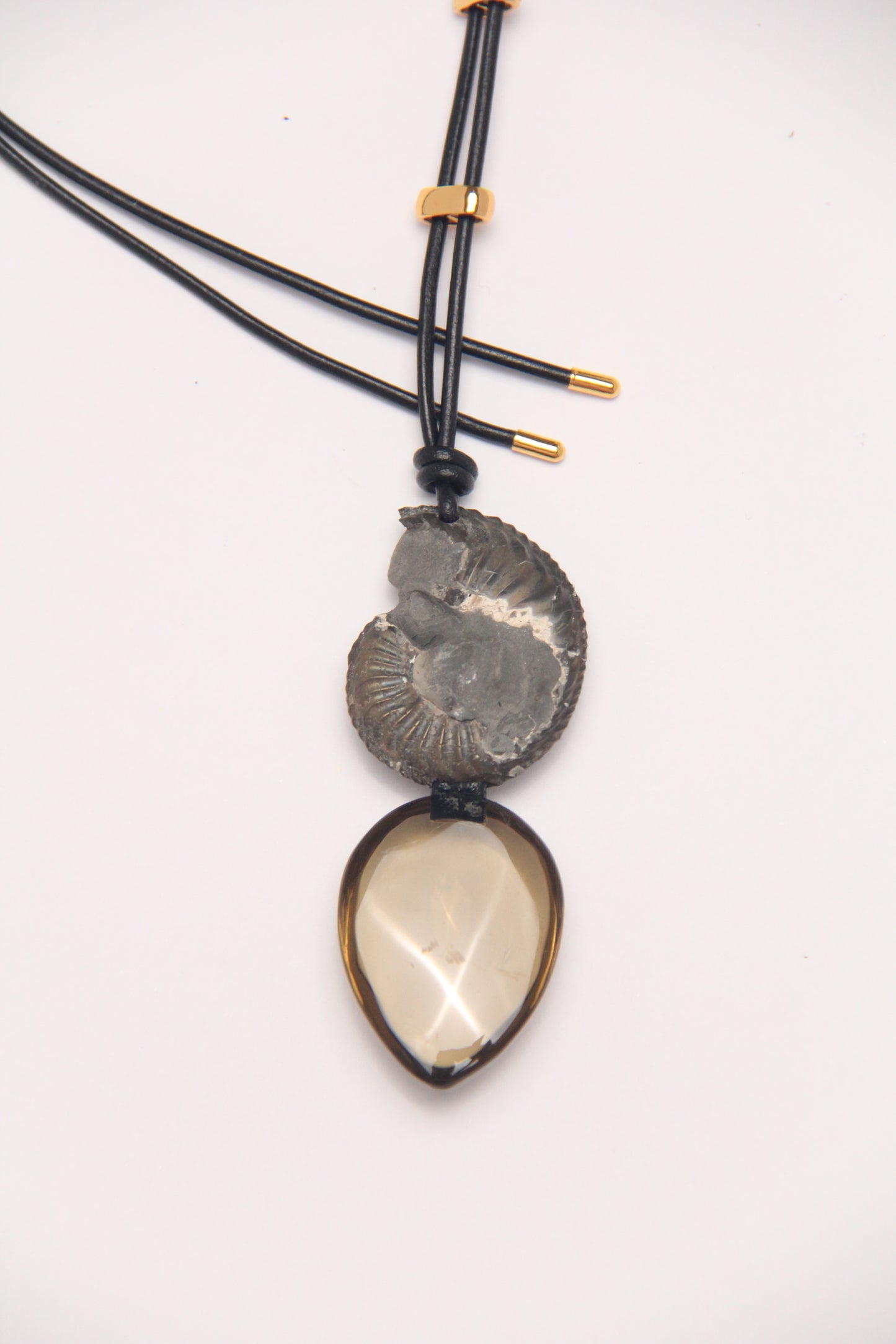 Pendant: ammonite fossil, citrine, leather
