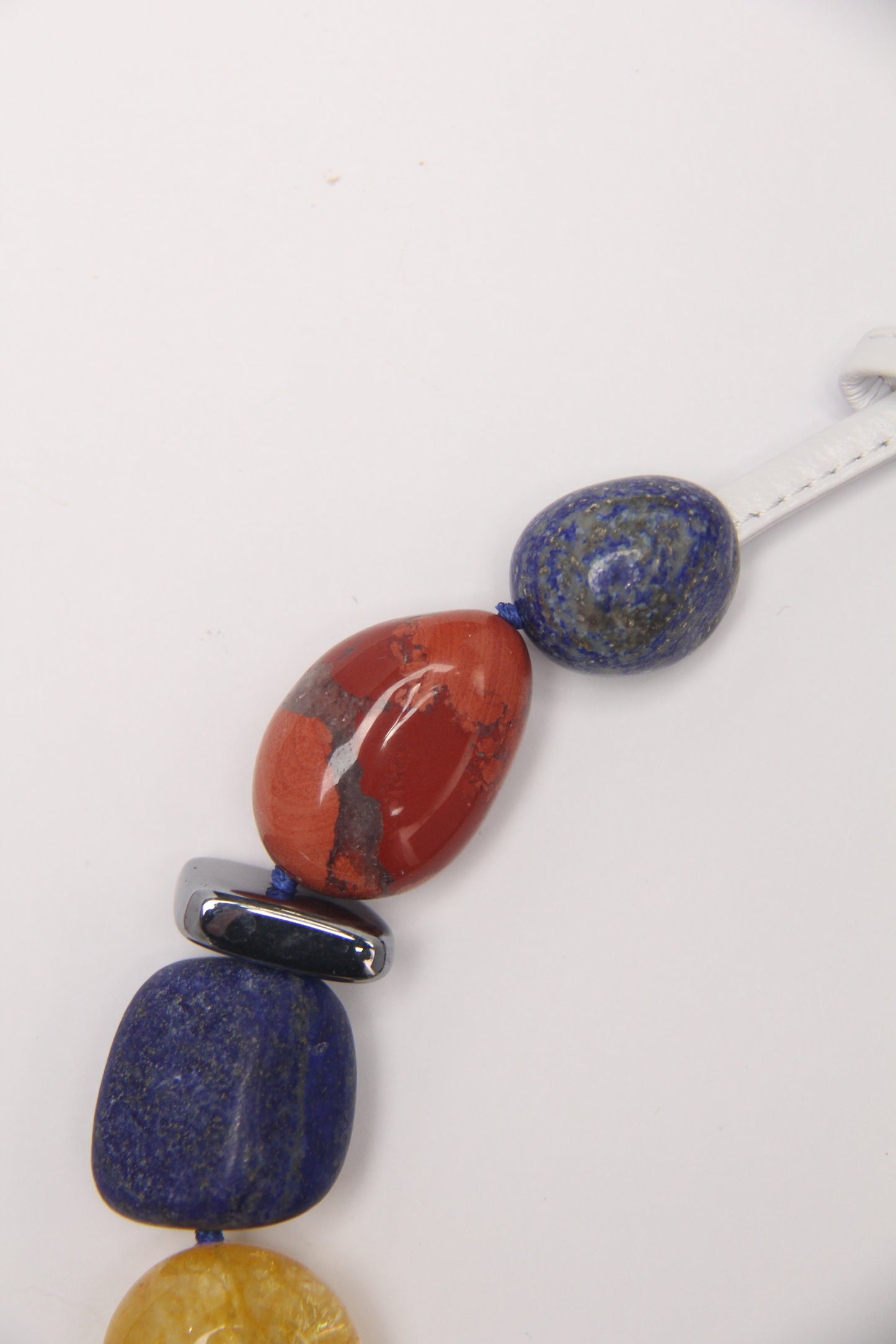 Necklace: blue apatite, blue lace agate, lapis lazuli, red jasper stone, colored hematoid quartz, titanium magnet