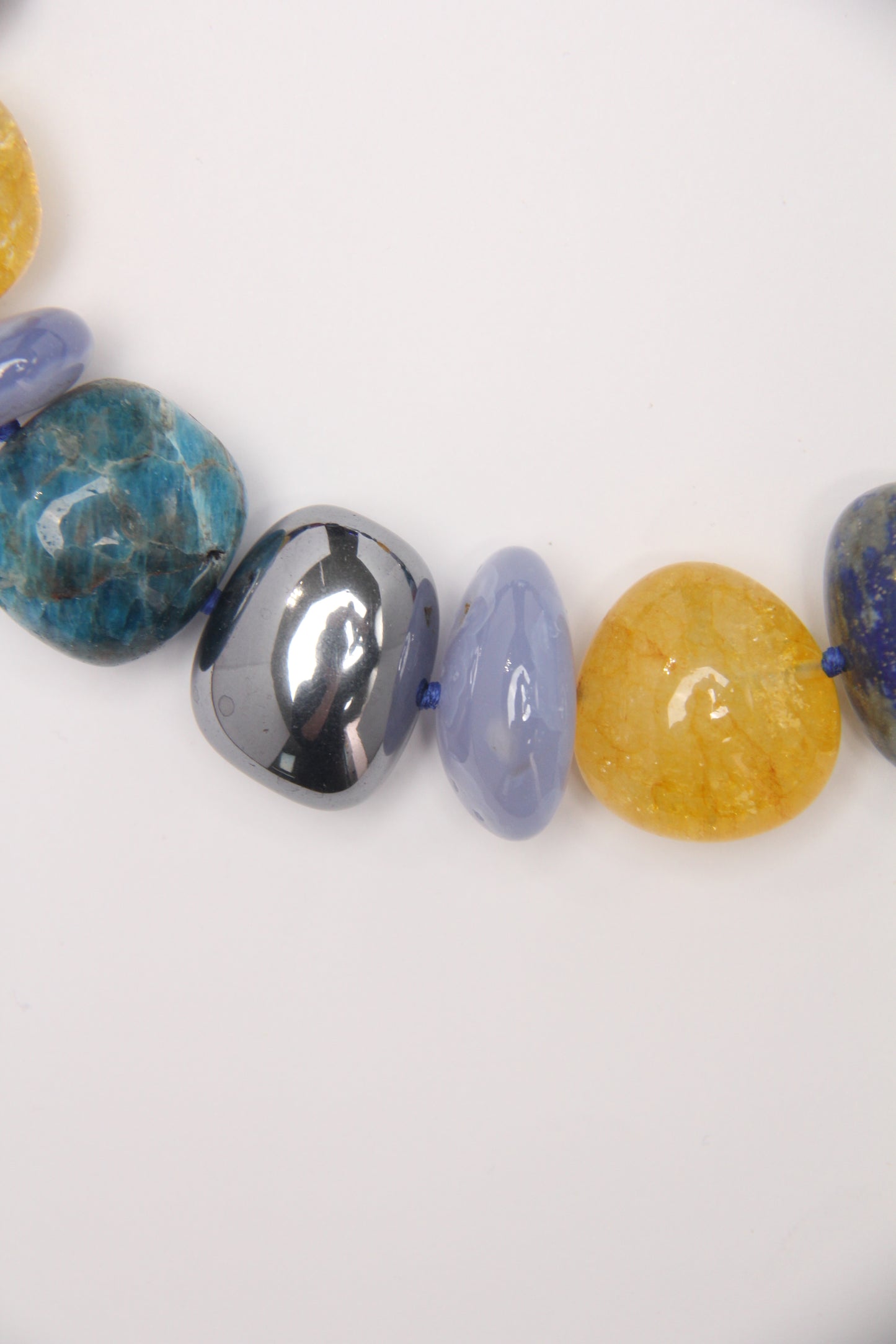 Necklace: blue apatite, blue lace agate, lapis lazuli, red jasper stone, colored hematoid quartz, titanium magnet