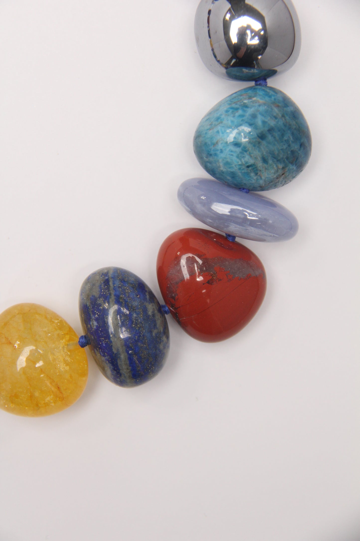 Necklace: blue apatite, blue lace agate, lapis lazuli, red jasper stone, colored hematoid quartz, titanium magnet