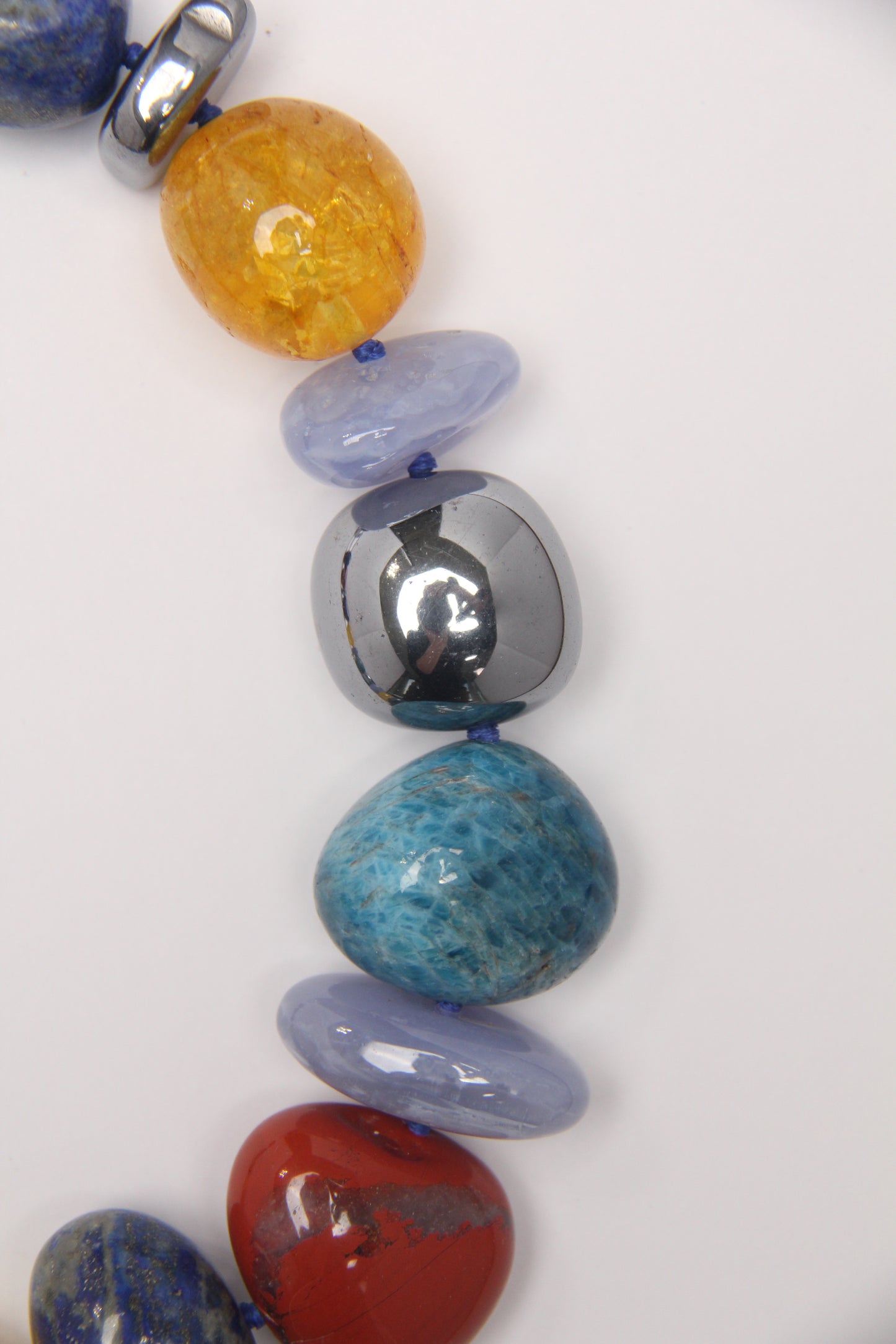 Necklace: blue apatite, blue lace agate, lapis lazuli, red jasper stone, colored hematoid quartz, titanium magnet