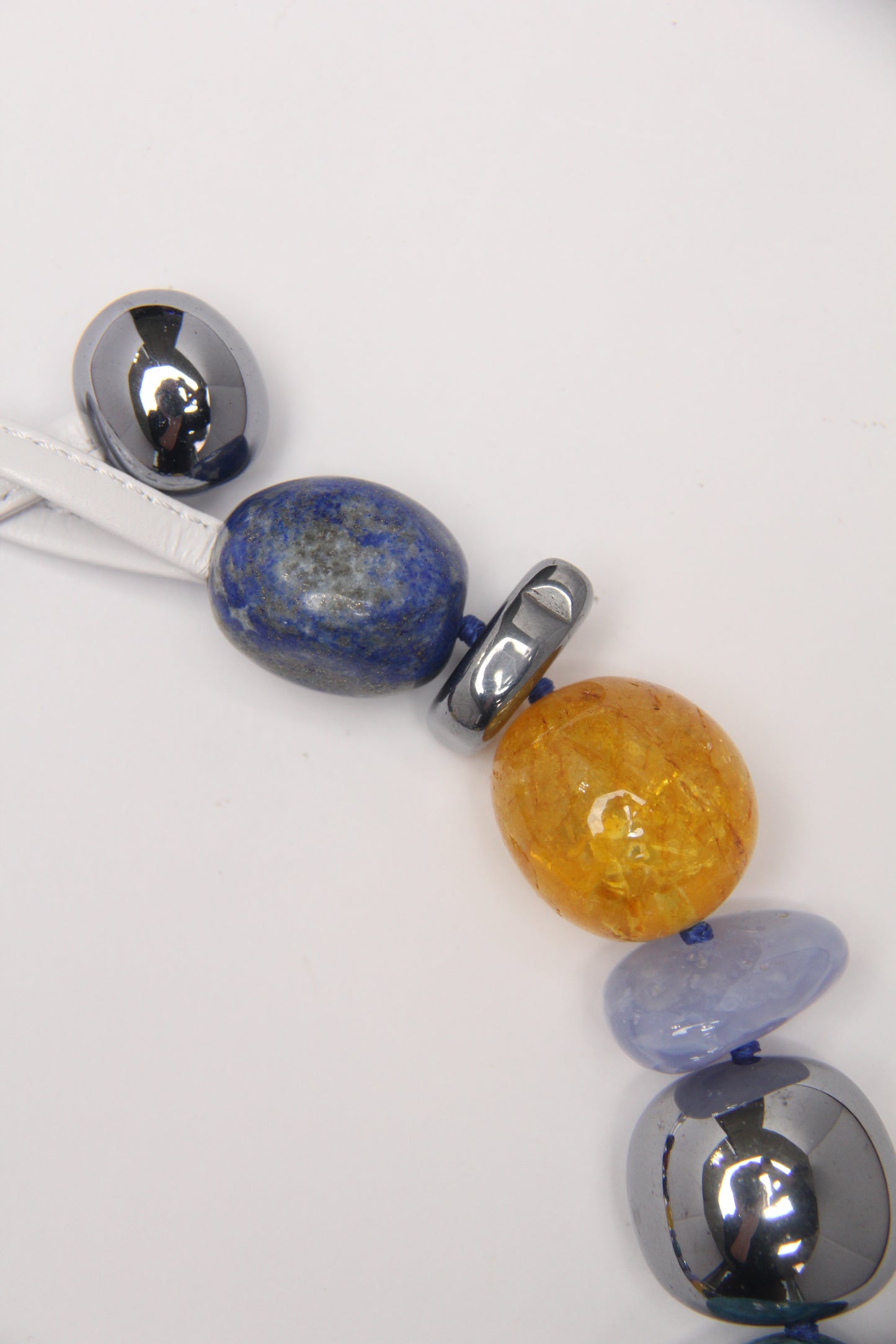 Necklace: blue apatite, blue lace agate, lapis lazuli, red jasper stone, colored hematoid quartz, titanium magnet