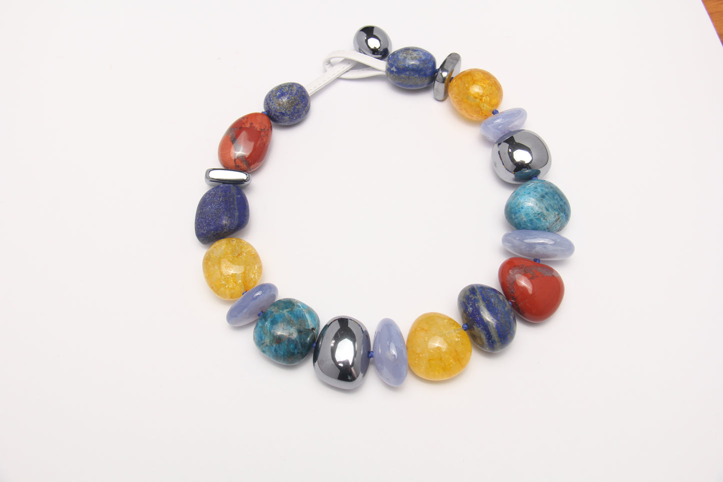 Necklace: blue apatite, blue lace agate, lapis lazuli, red jasper stone, colored hematoid quartz, titanium magnet