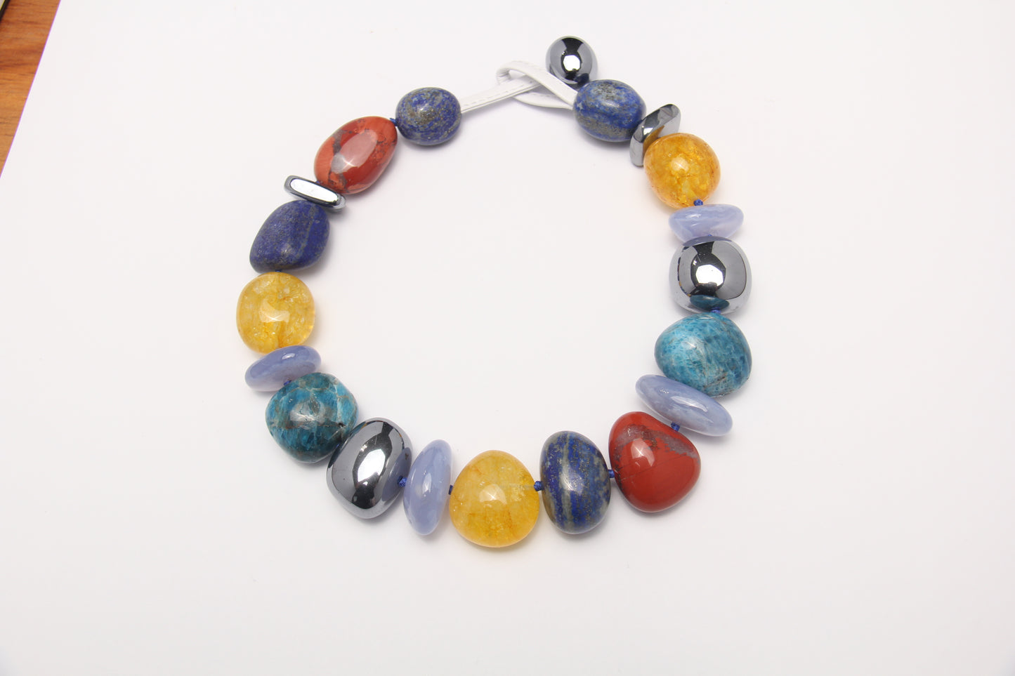 Necklace: blue apatite, blue lace agate, lapis lazuli, red jasper stone, colored hematoid quartz, titanium magnet